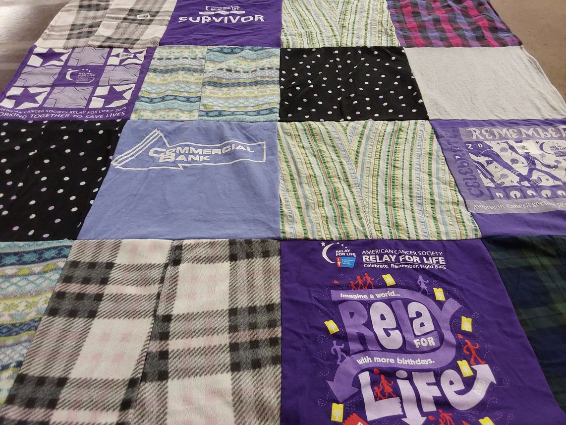 T-shirt quilt with cancer awareness, charity events themes by Laura from SC