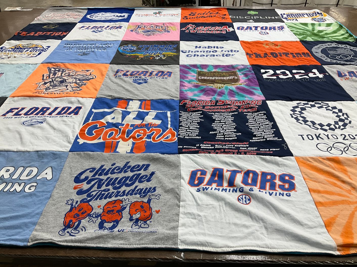 T-shirt quilt featuring gators swimming team by Ambia from FL