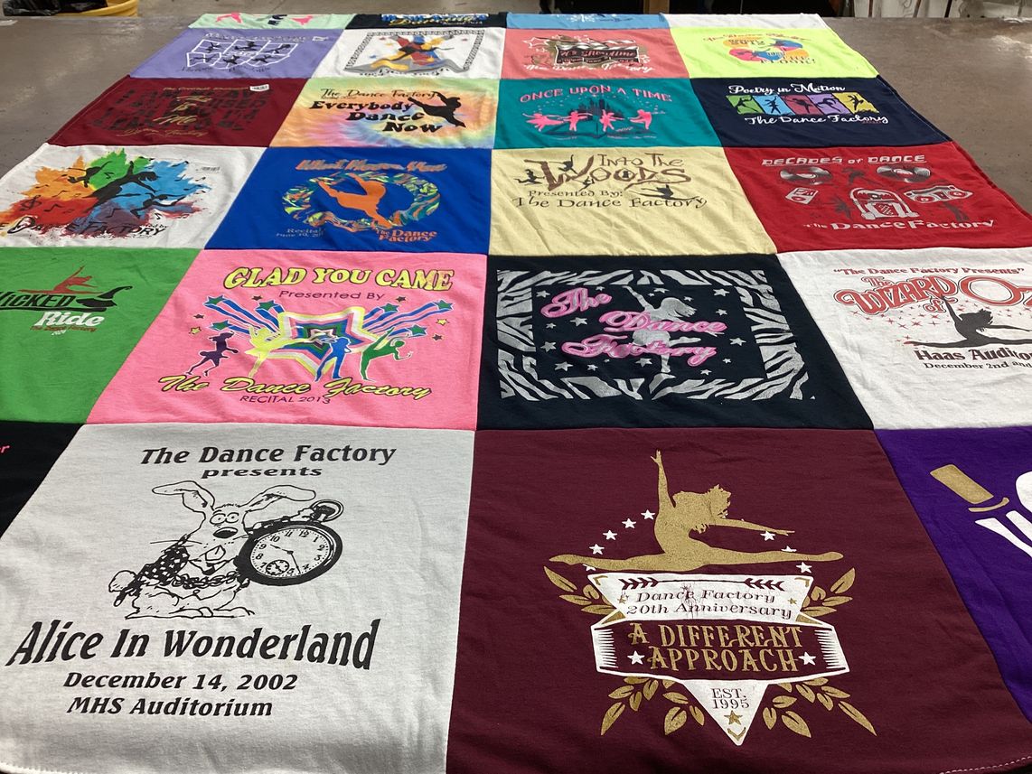 T-shirt quilt with dance, theater themes by Jill from LA