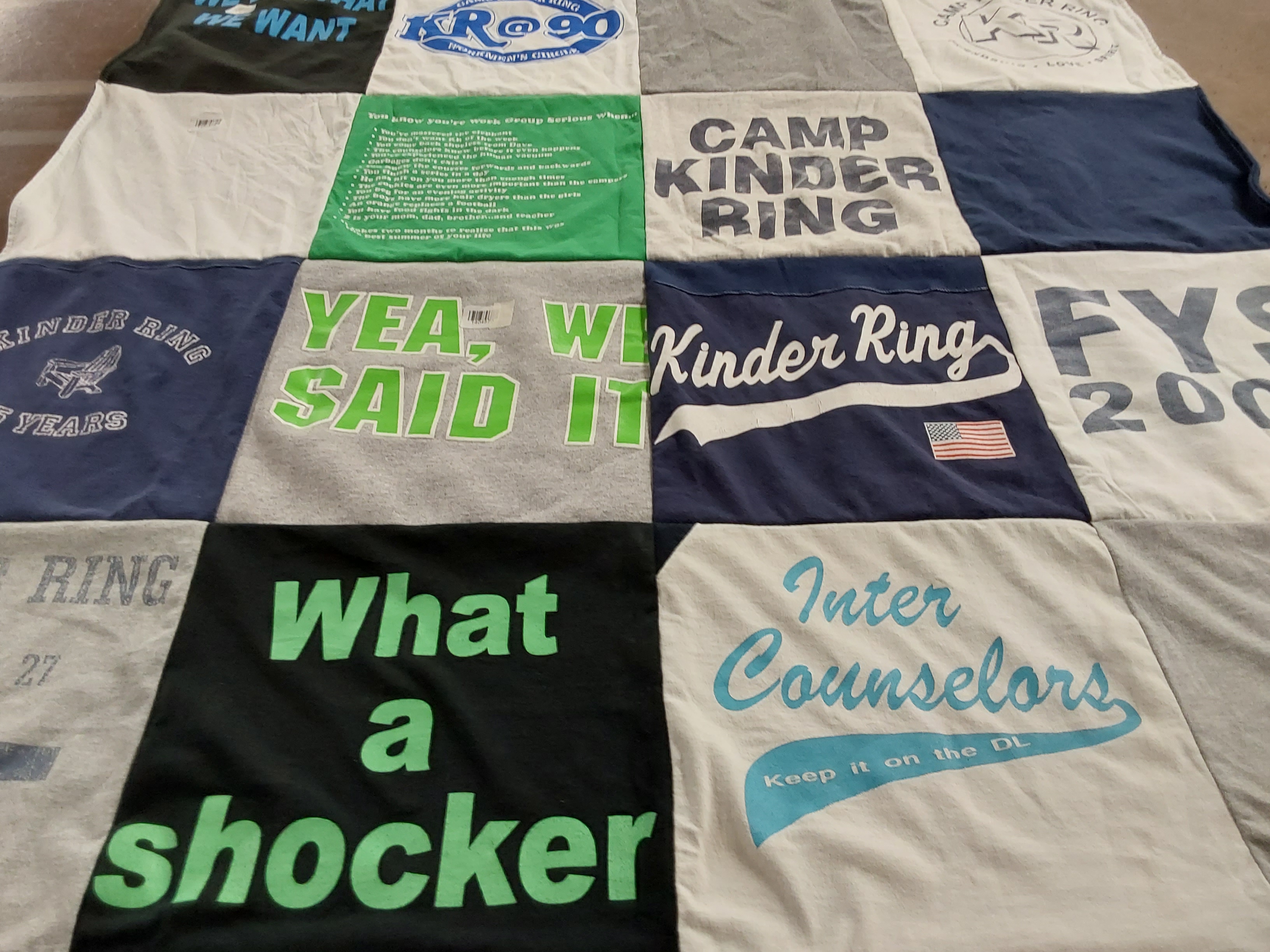 T-shirt quilt with camping, counseling themes by Judith from NJ