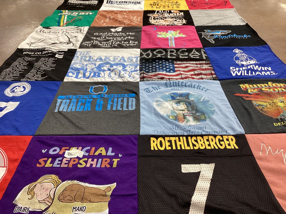 T-shirt quilt featuring ocean side landsharks track & field by kim from SC