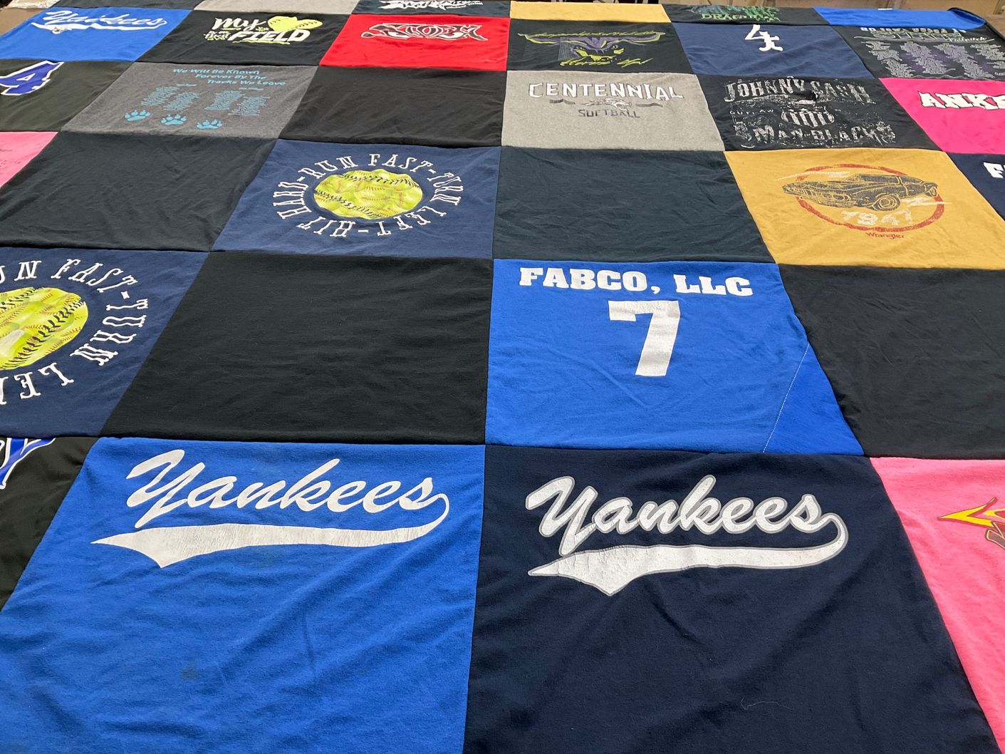 T-shirt quilt with softball, sports themes by Chrystal from IA
