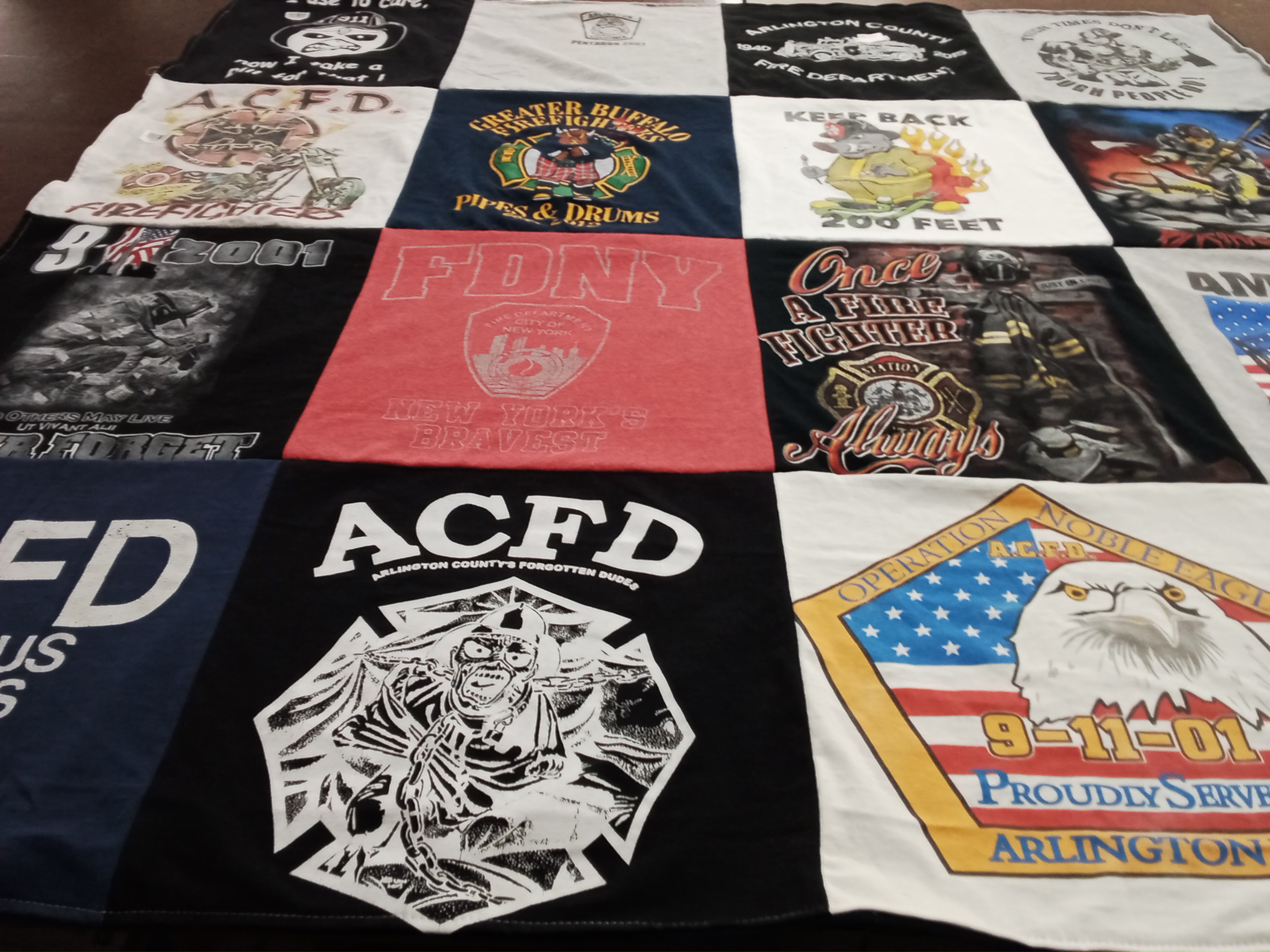 T-shirt quilt with firefighting, first responders themes by Jeffrey from NY