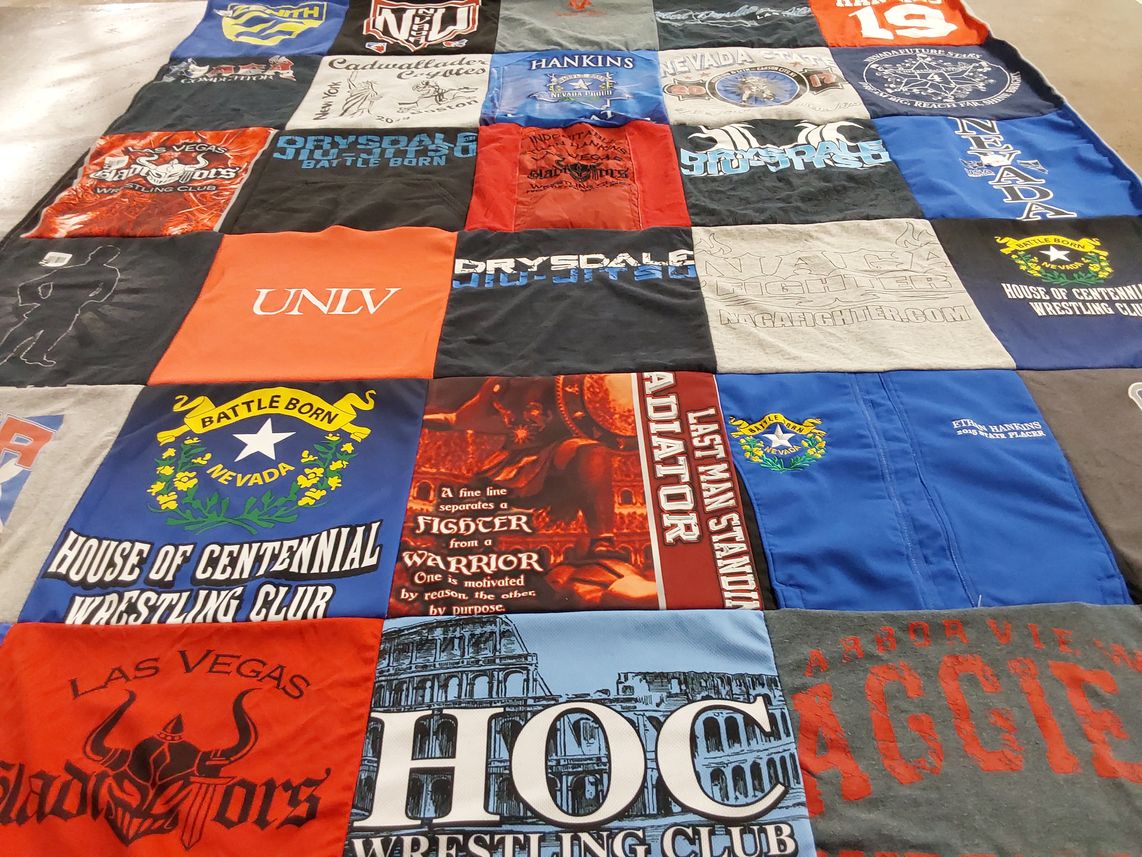 T-shirt quilt featuring nevada wolf pack, university of nevada las vegas wrestling team by Melody from NV