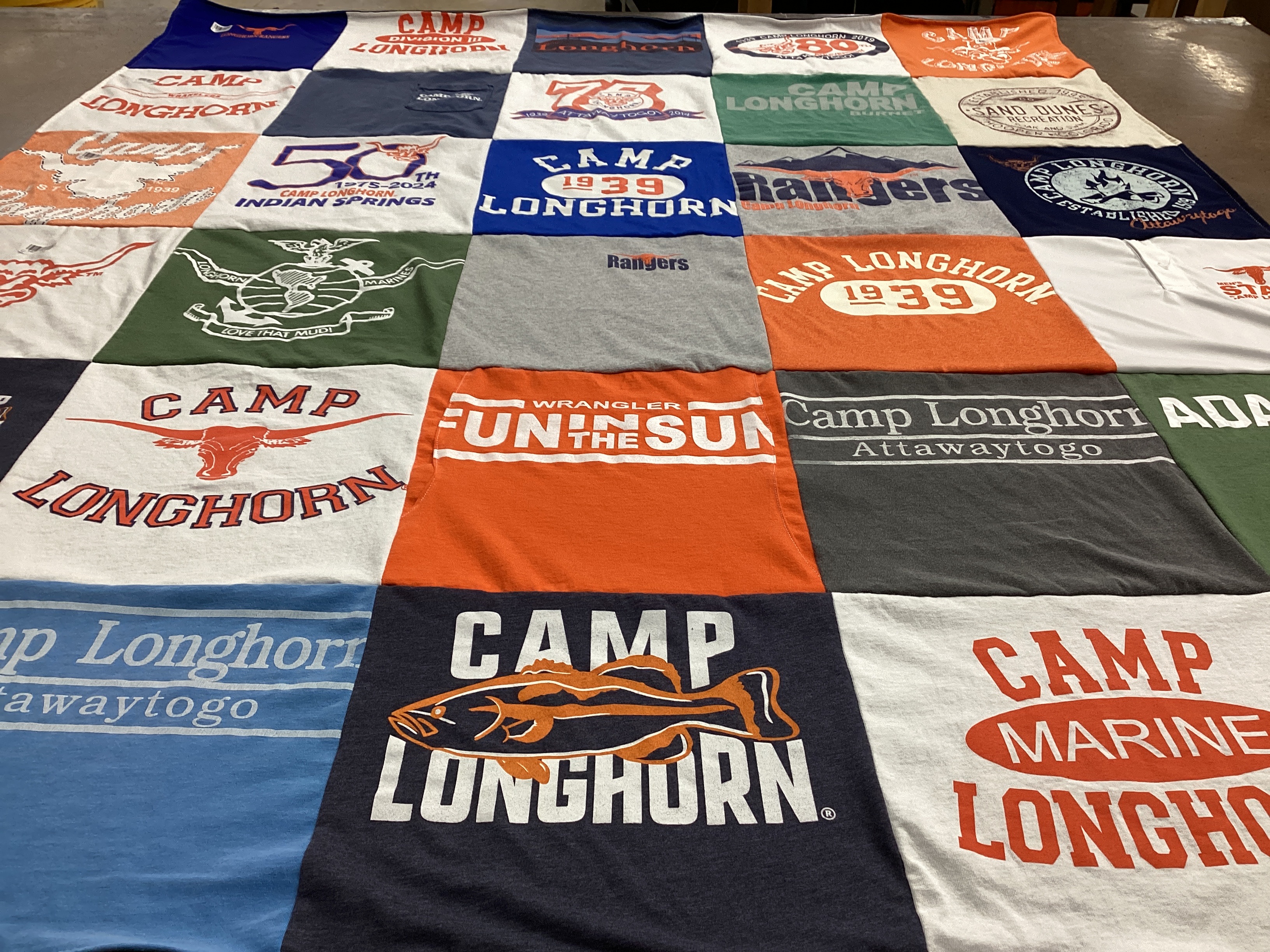T-shirt quilt with camping, outdoor activities themes by Angela from TX