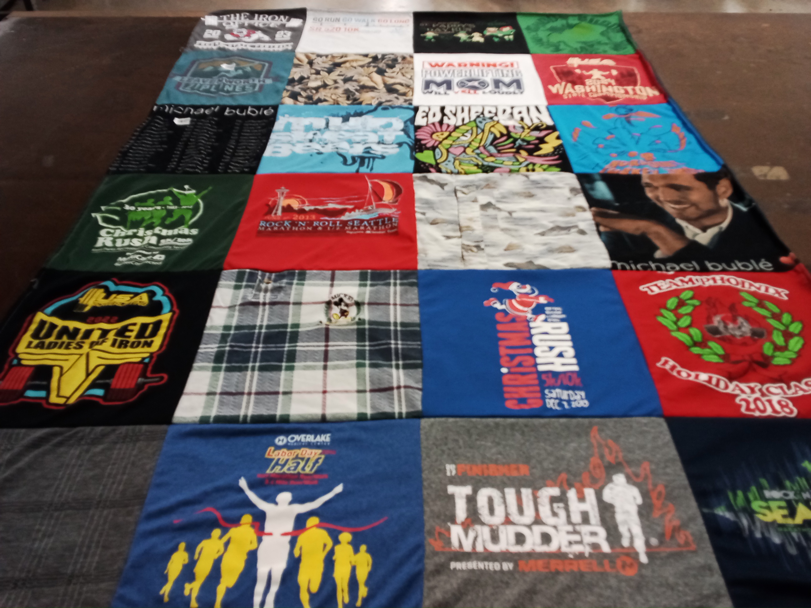 T-shirt quilt with running, music themes by Traci from WA