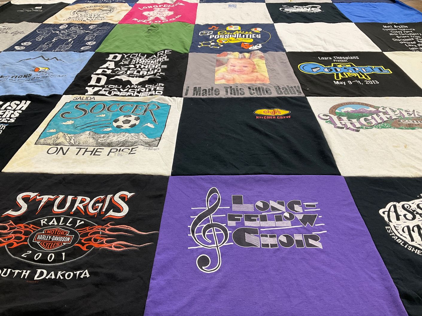 T-shirt quilt with soccer, choir themes by Grant A. from CA