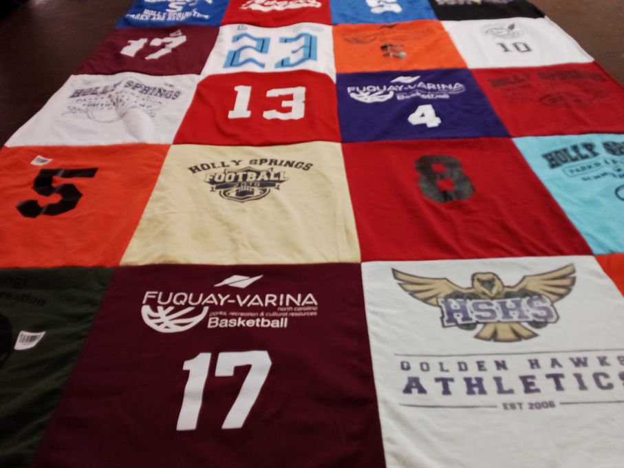T-shirt quilt featuring holly springs high school, fuquay-varina high school by Nicole from NC