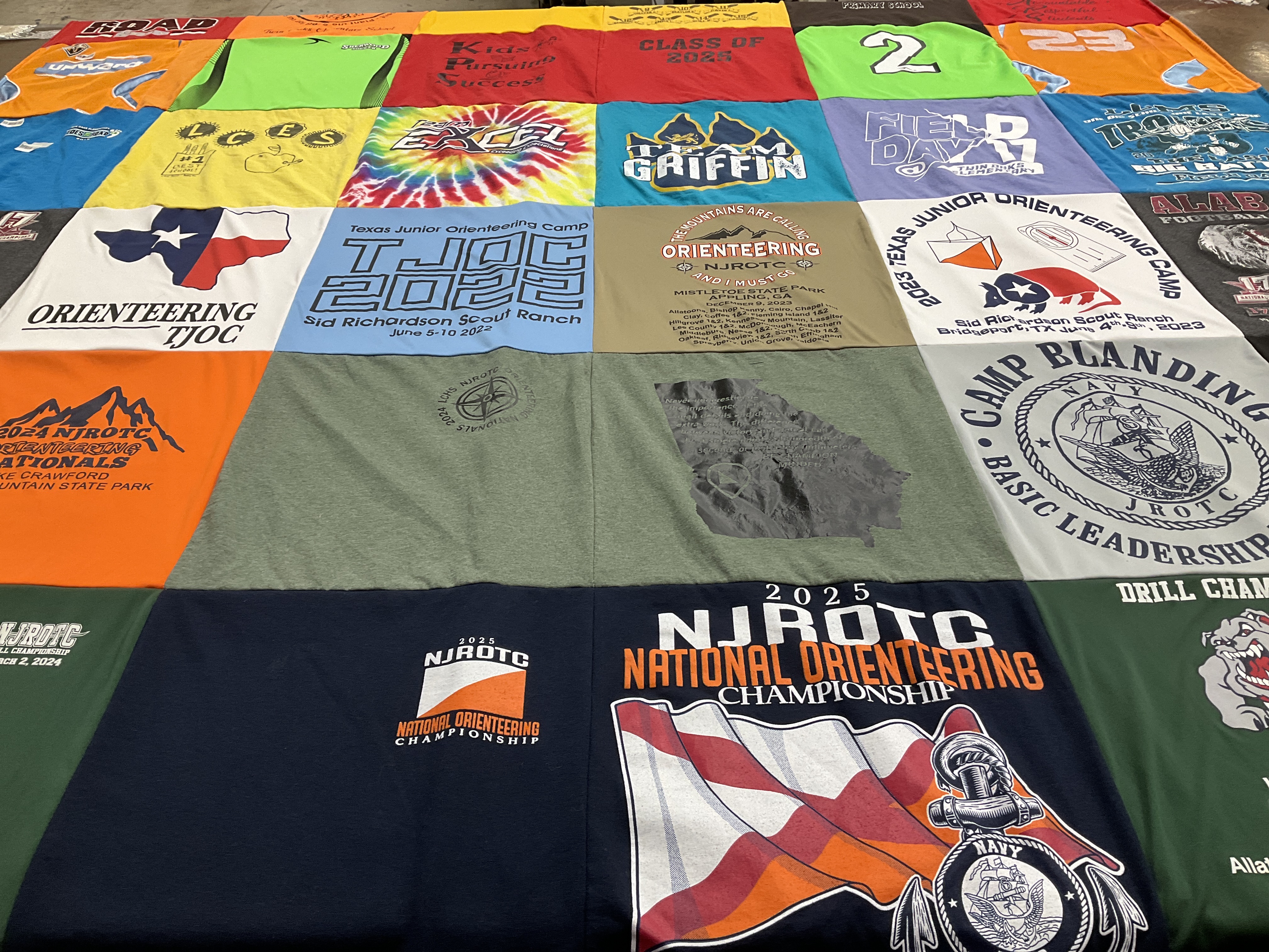 T-shirt quilt with orienteering, leadership themes by Gloria from GA