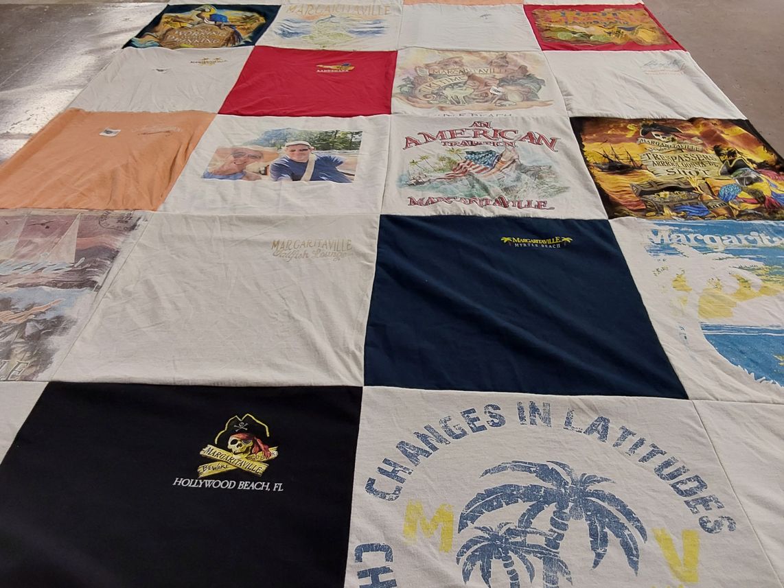 T-shirt quilt with beach, travel themes by Amanda from VA