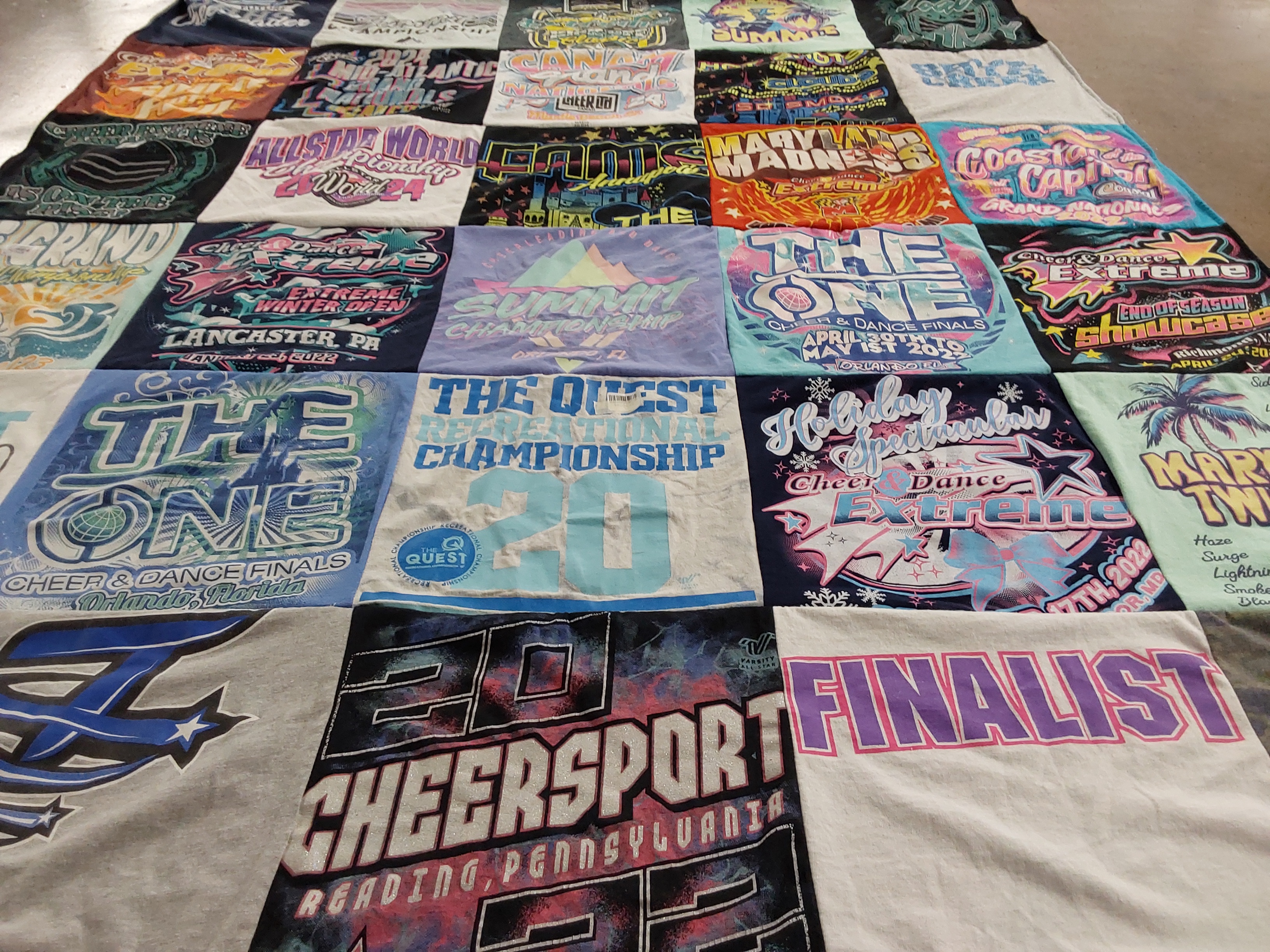 T-shirt quilt with cheerleading, dance themes by Stacy from MD