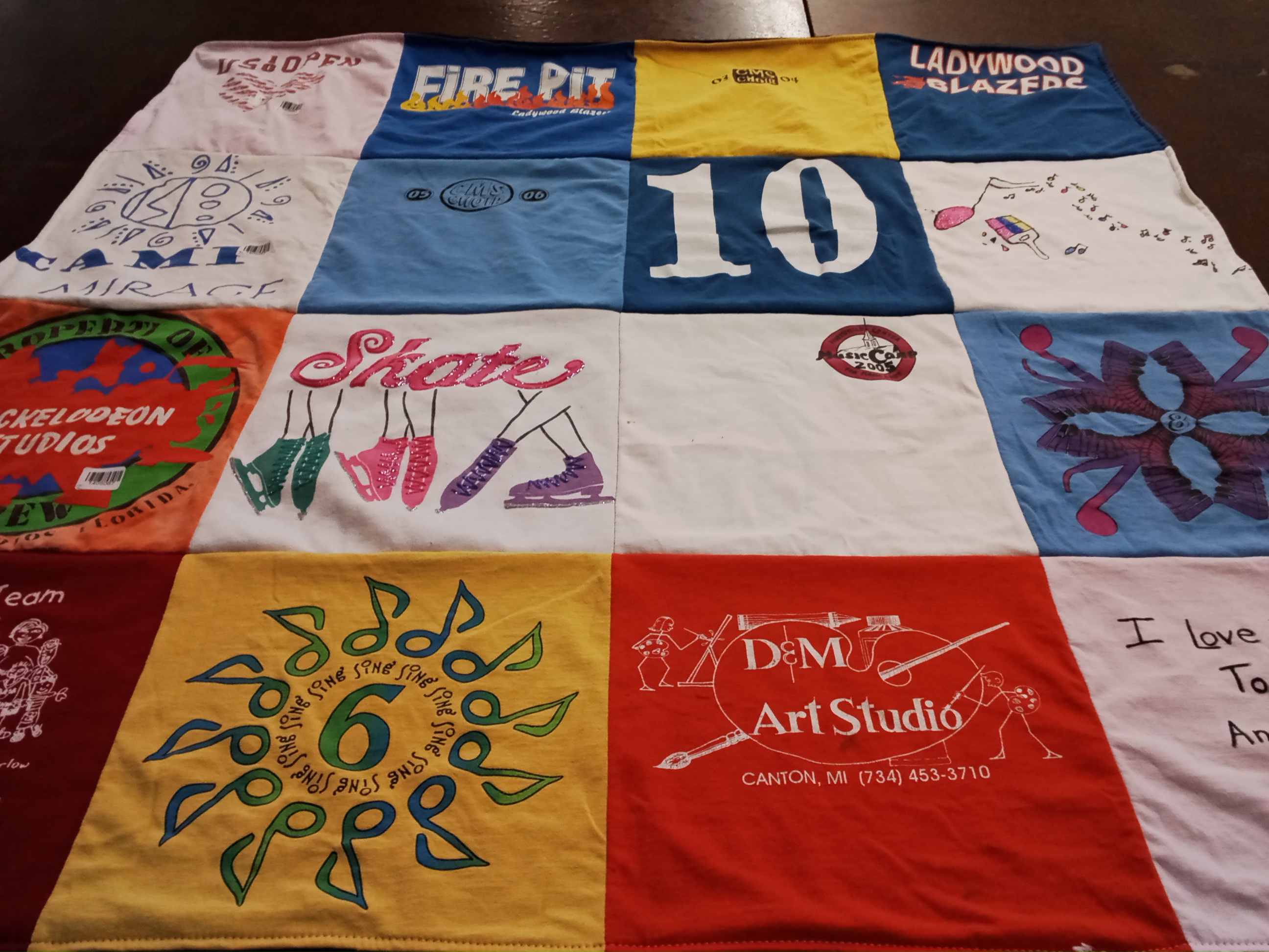 T-shirt quilt with art, skating themes by Dave from MI