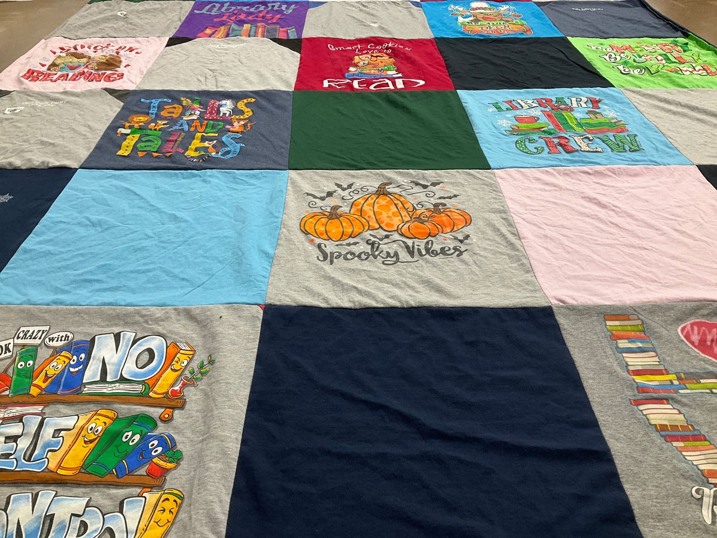 T-shirt quilt with reading, literature themes by Candace from OH