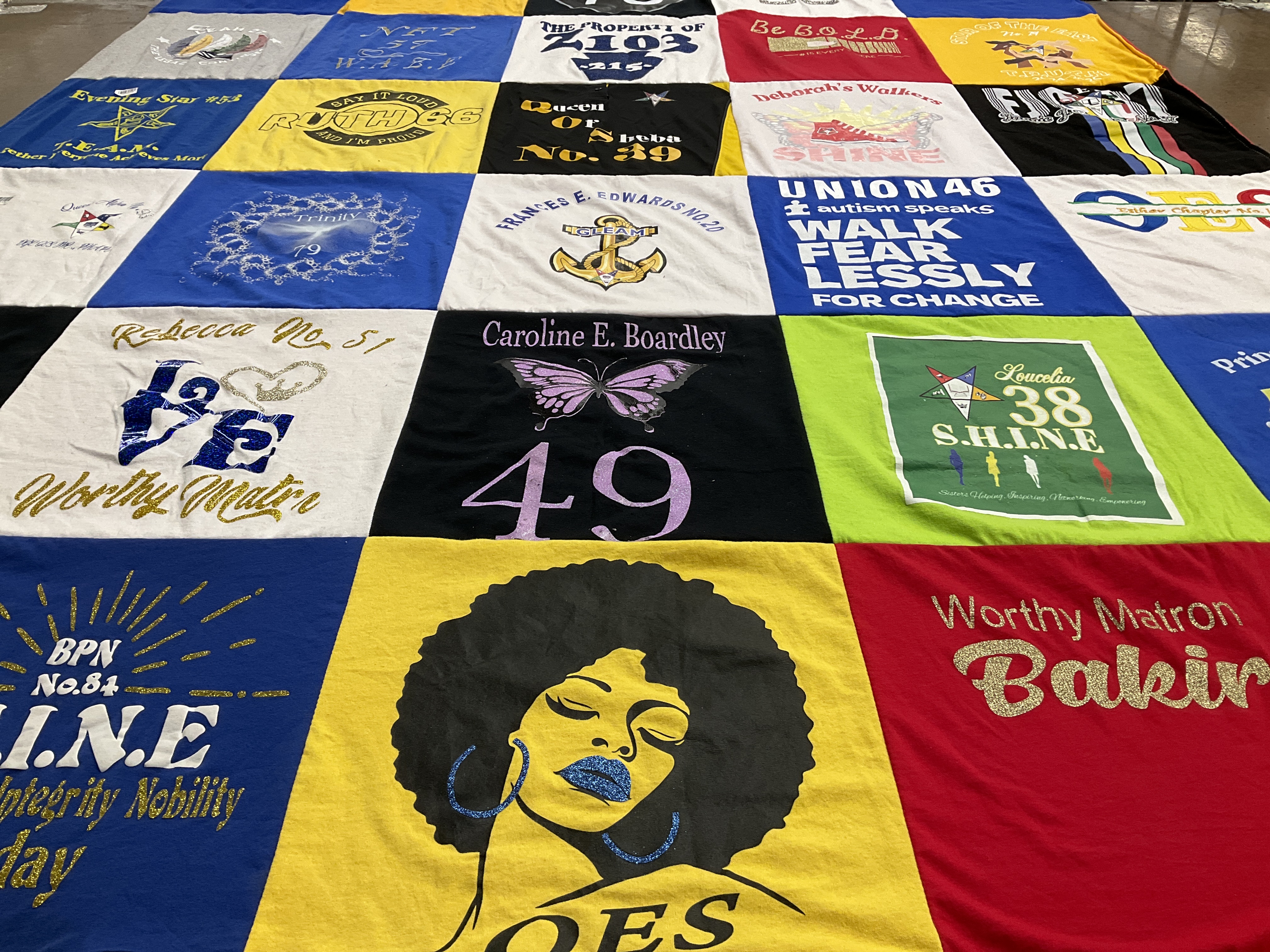 T-shirt quilt with community service, autism advocacy themes by sirlena from PA