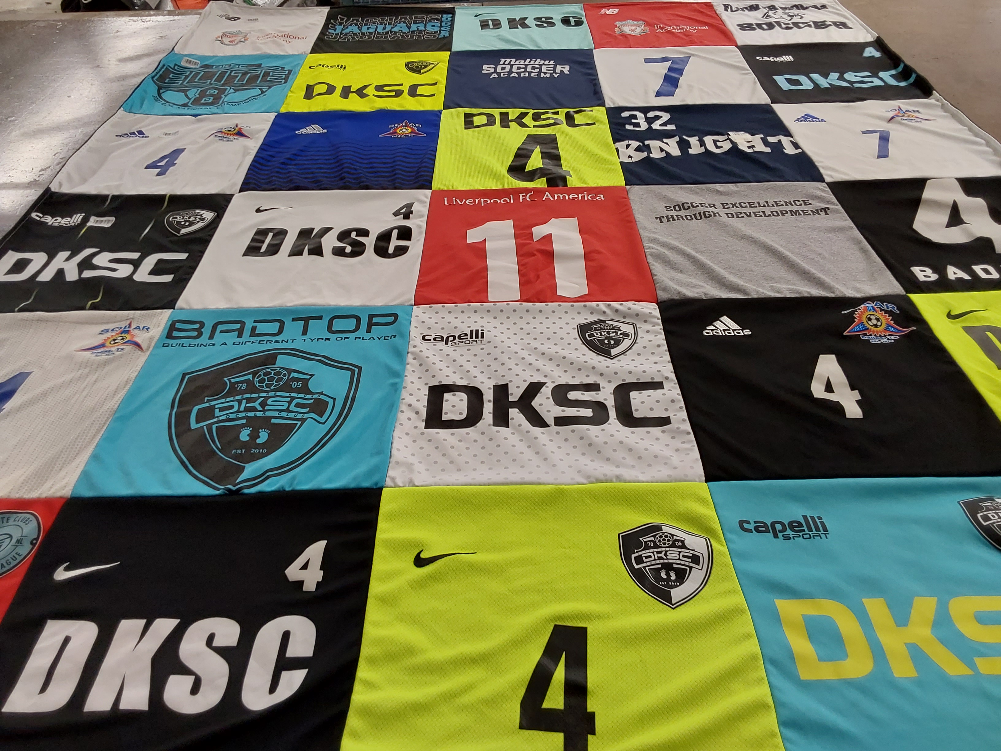 T-shirt quilt with soccer, sports themes by Kelly from TX