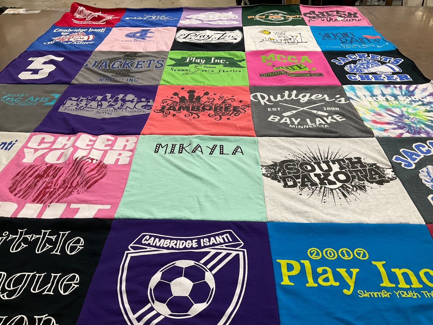 T-shirt quilt featuring isanti jackets by Tiffany from MN