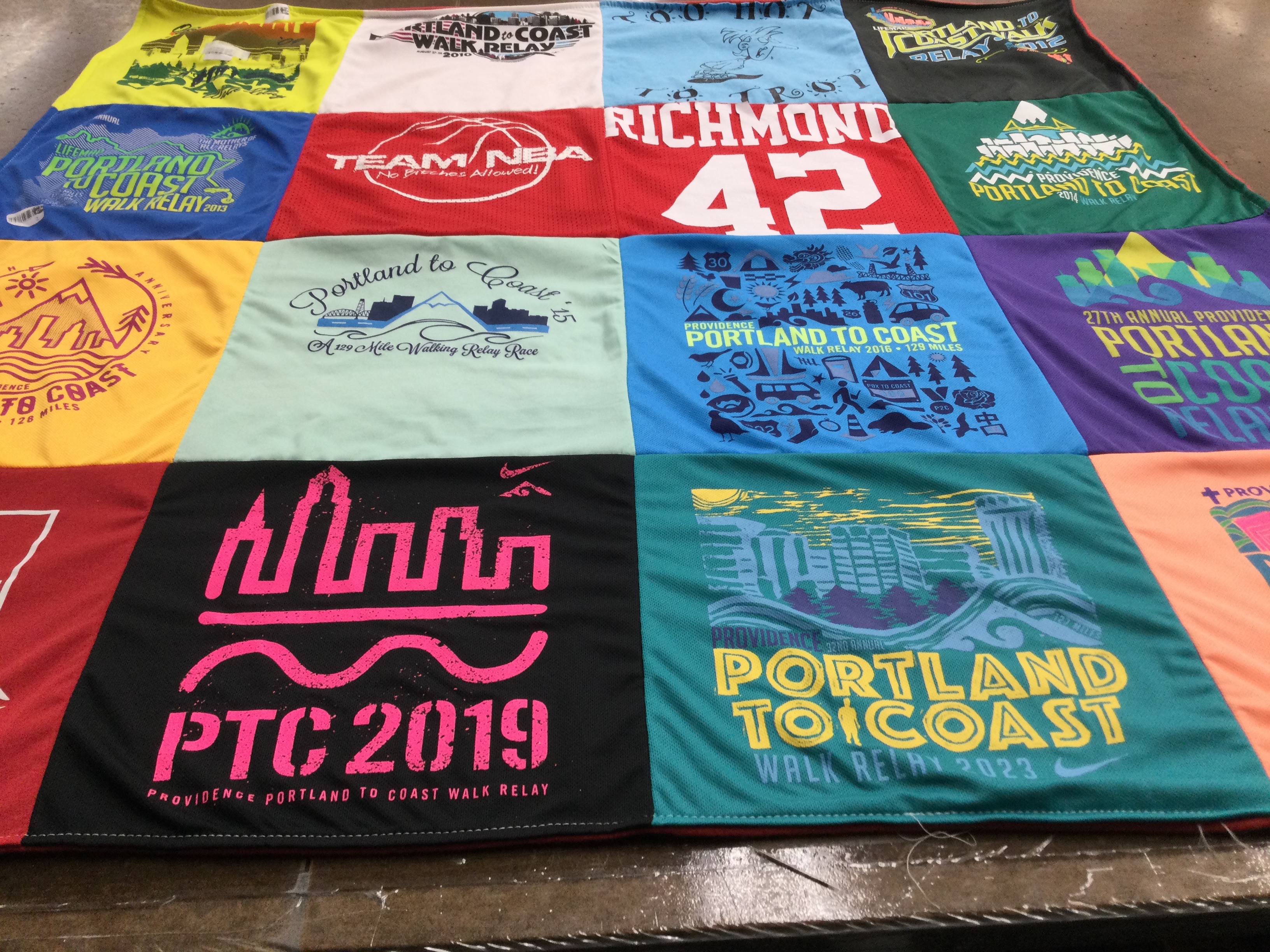 T-shirt quilt with walking, relay races themes by Lee from OR