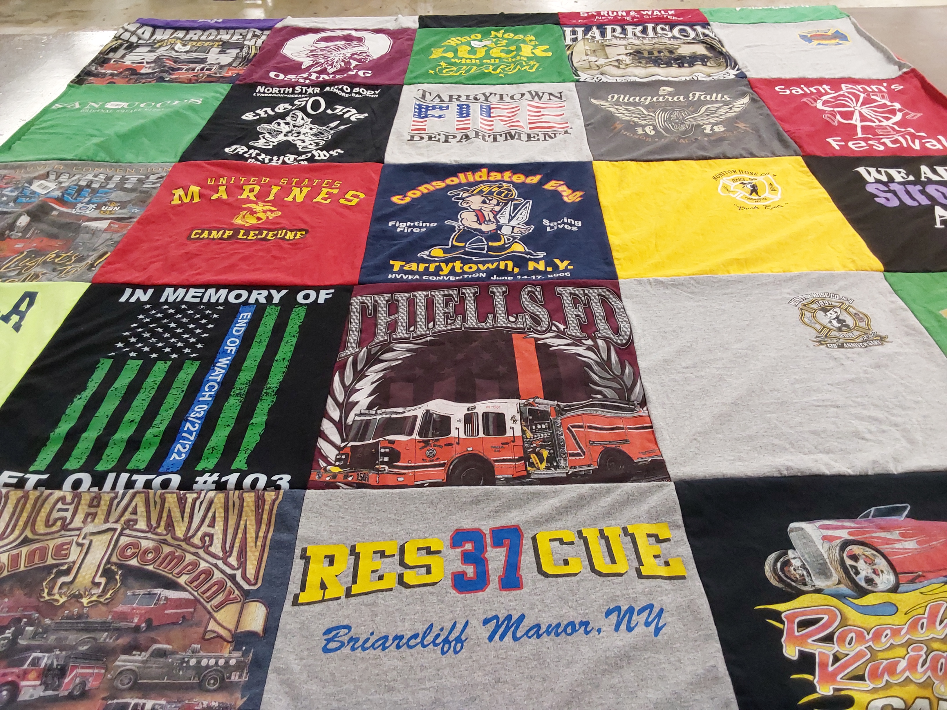 T-shirt quilt with firefighting, military themes by felicia from NY