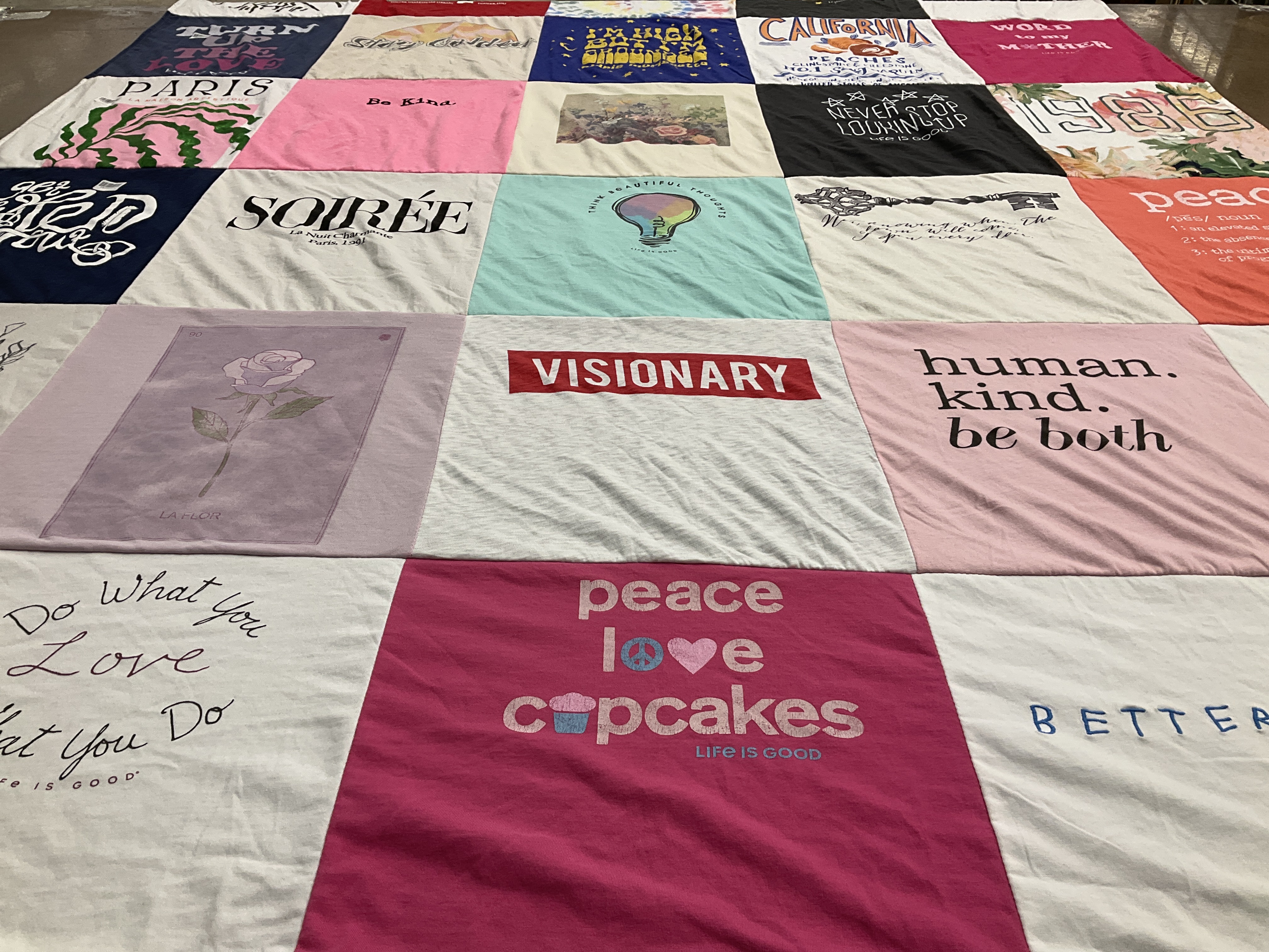 T-shirt quilt with baking, positivity themes by Eve from PA