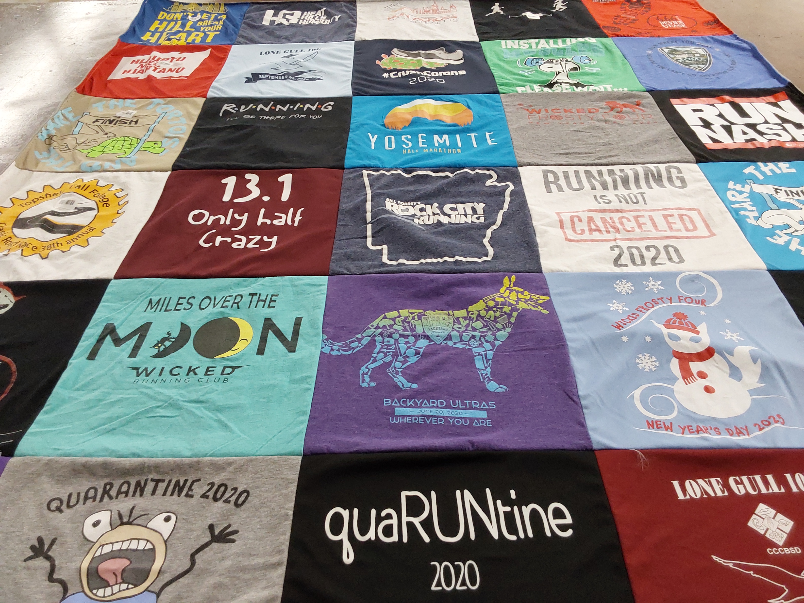 T-shirt quilt with running themes by Amie from MA