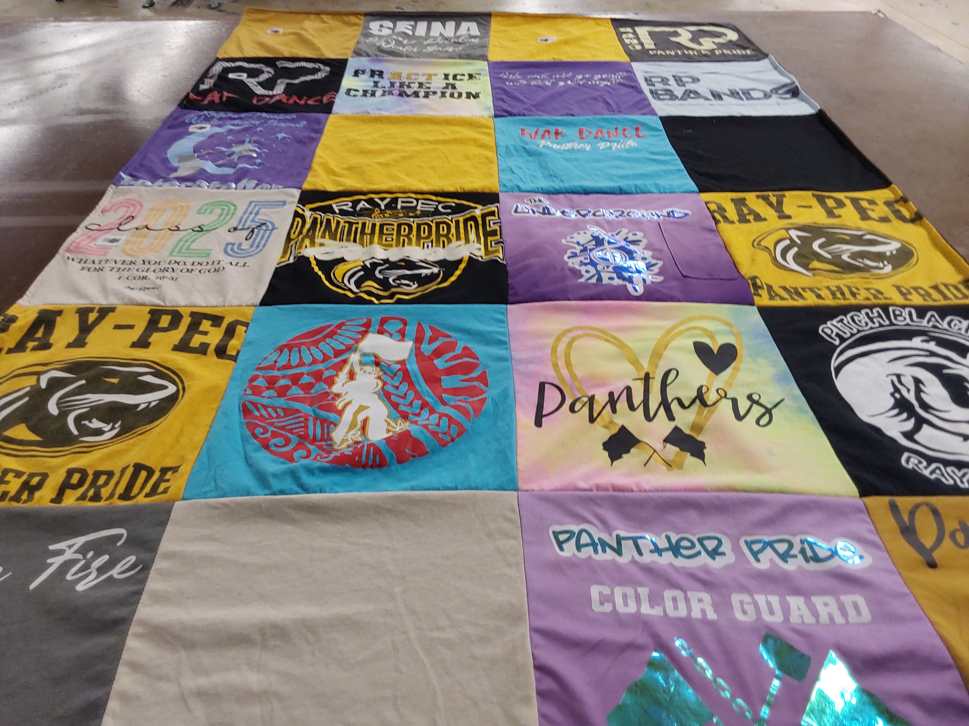 T-shirt quilt featuring raymore peculiar high school dance team, raymore peculiar high school color guard by Marian from MO