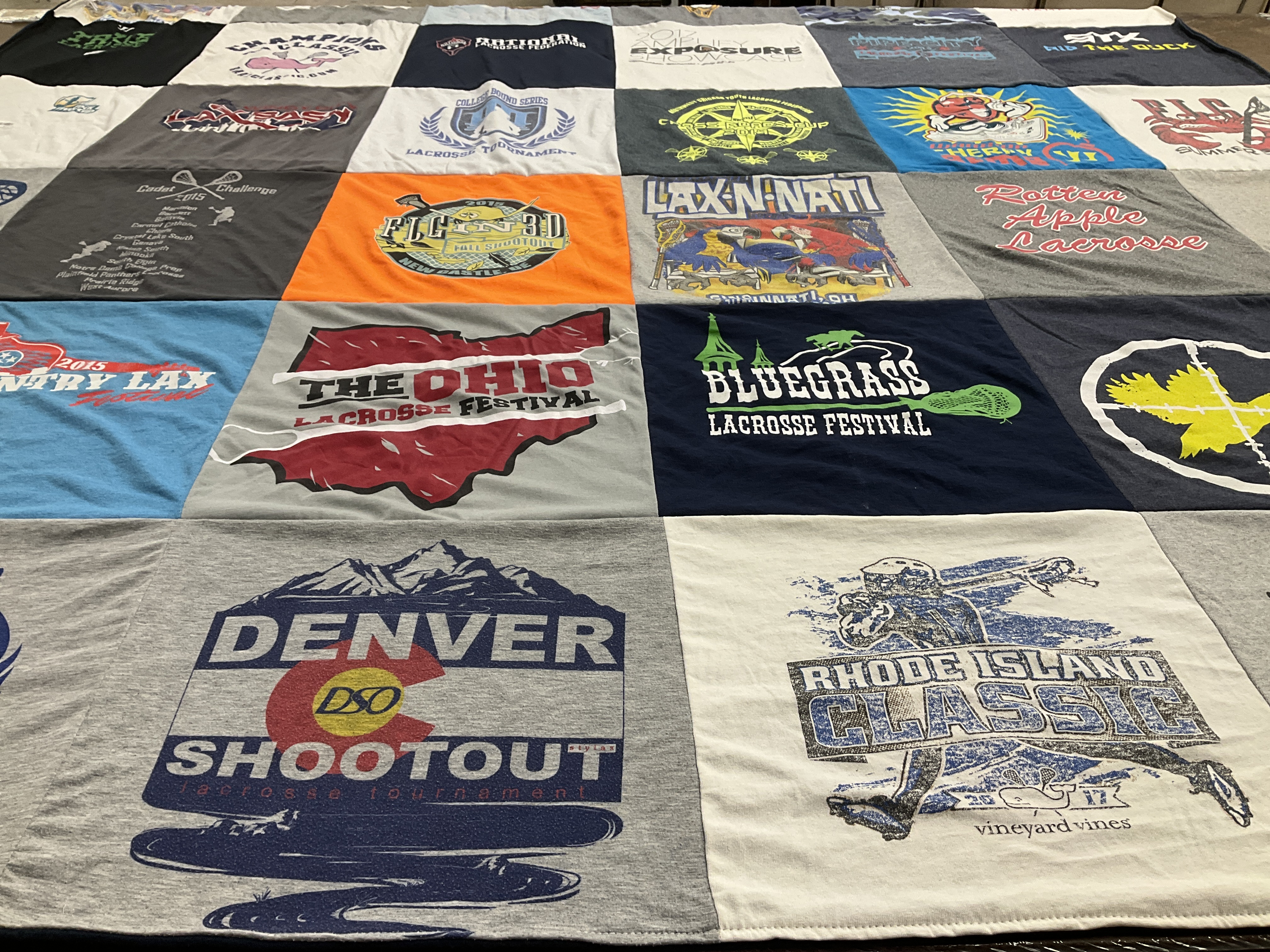 T-shirt quilt with lacrosse, sports themes by Gina from IL