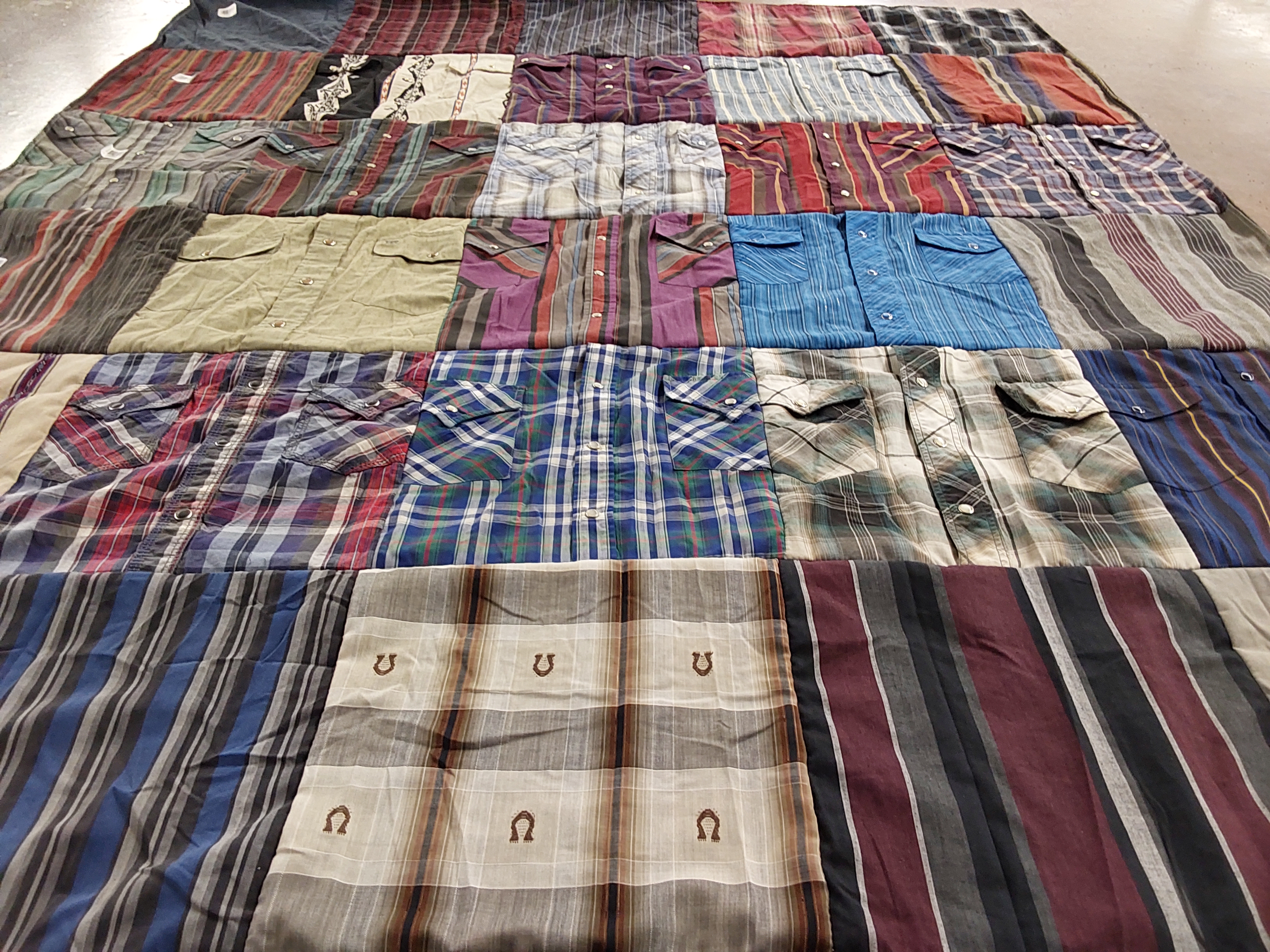 T-shirt quilt with fashion, textiles themes by Hannah from TX
