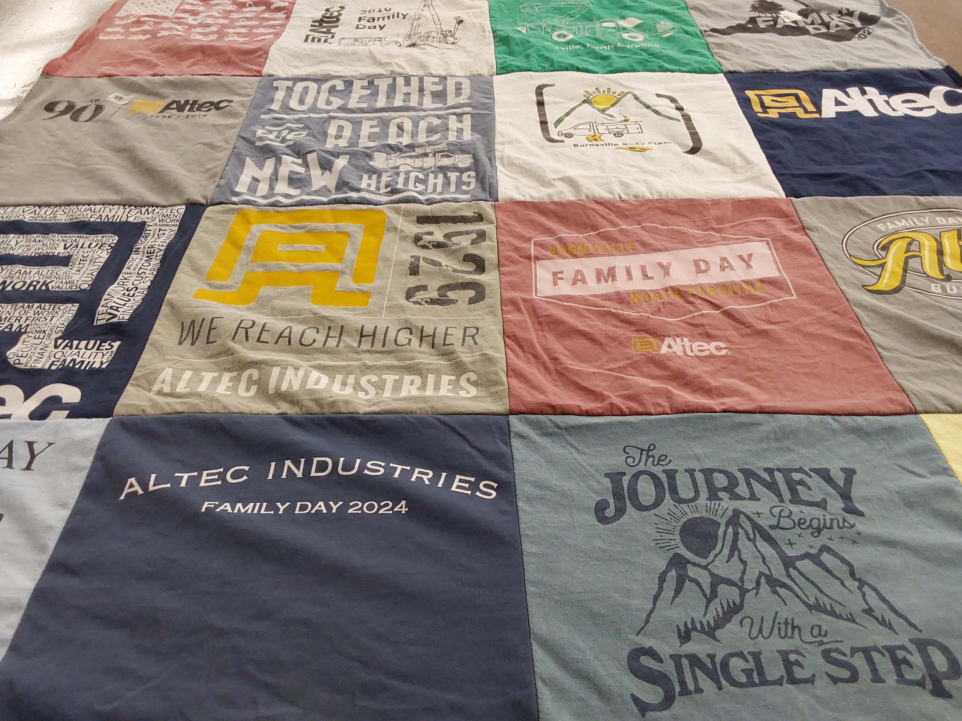 T-shirt quilt with family gatherings, team building themes by Barbie from NC