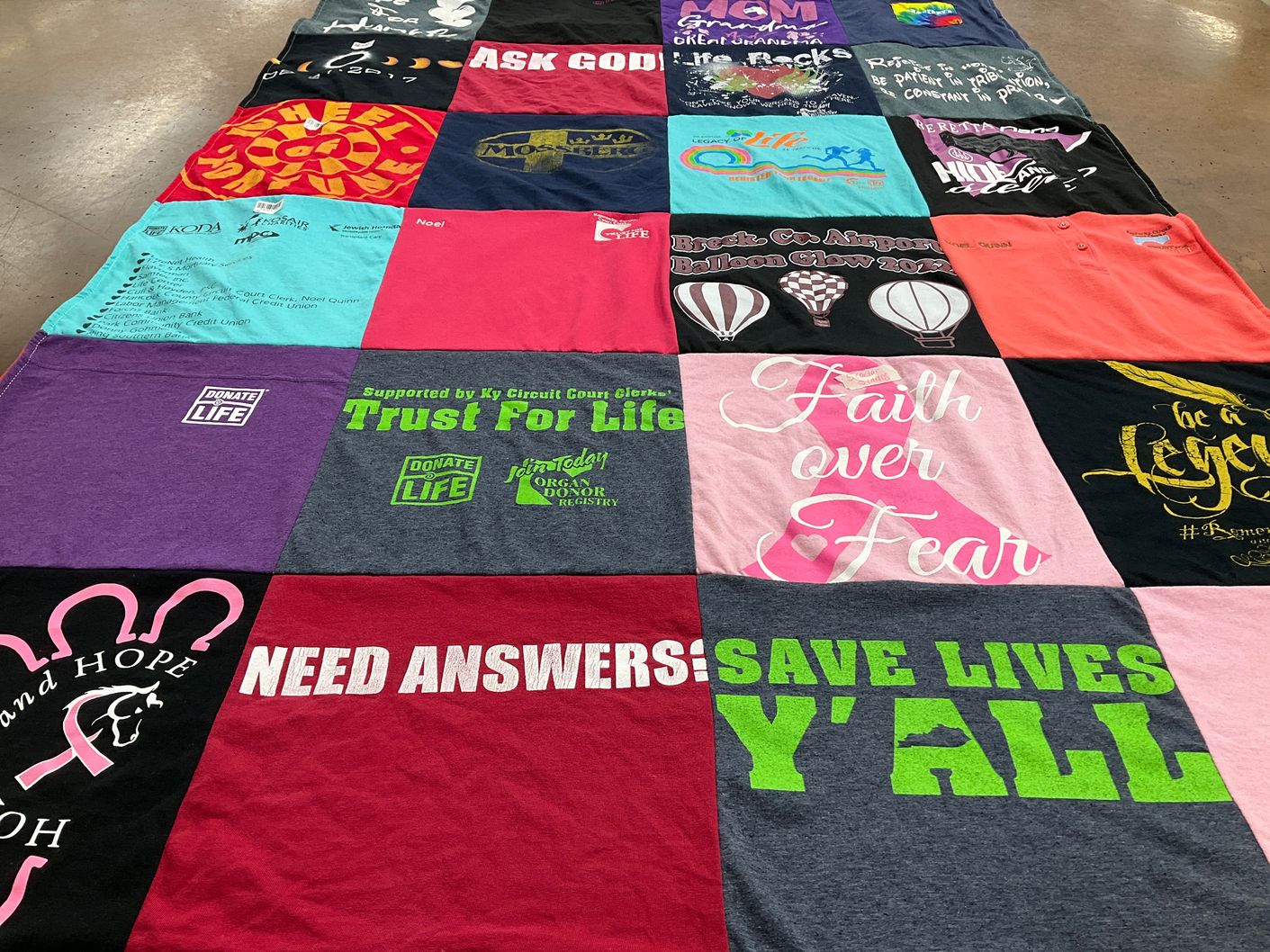 T-shirt quilt with community service, organ donation themes by noel from KY