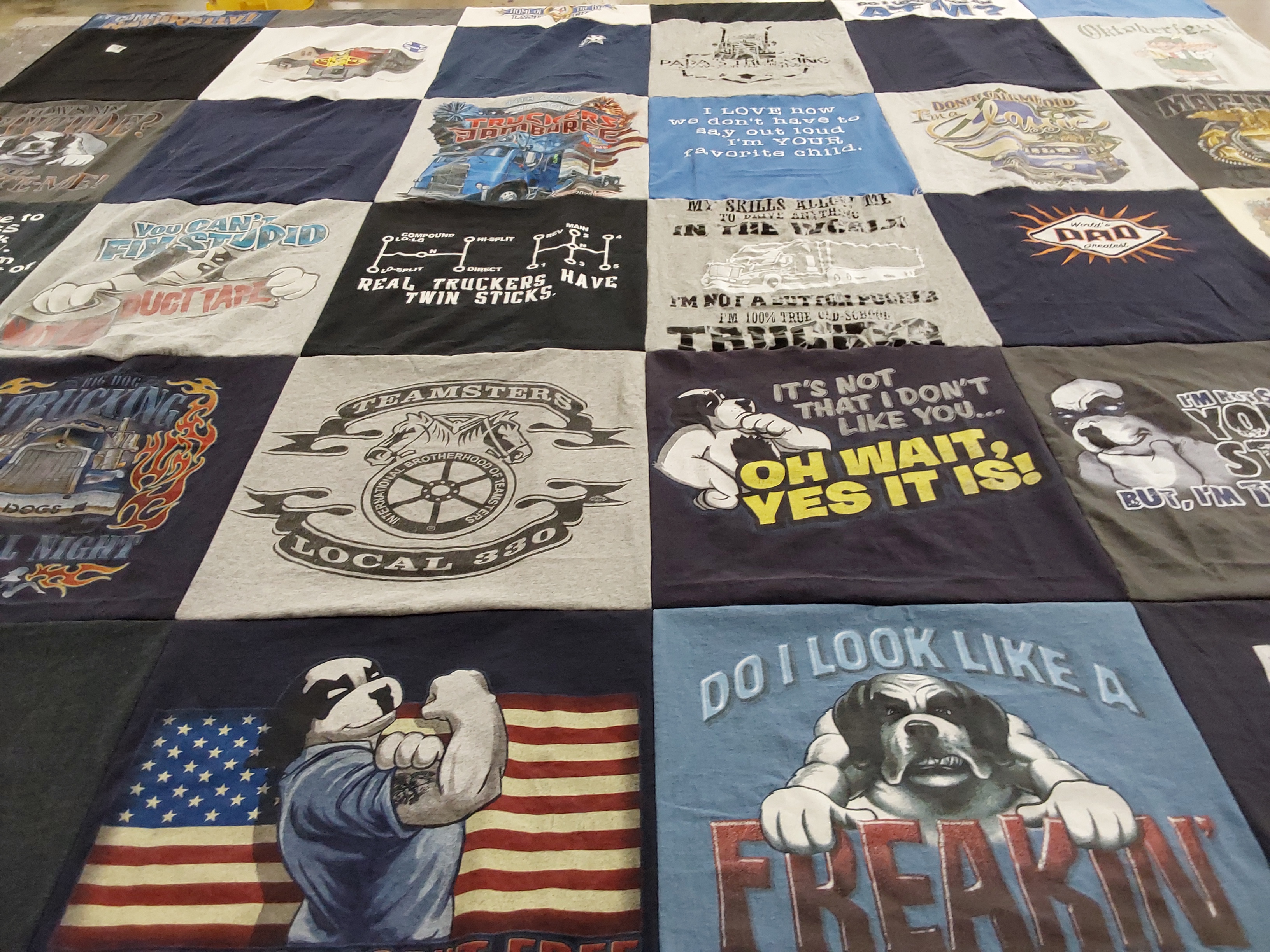 T-shirt quilt with trucking, humor themes by Kathy from IL
