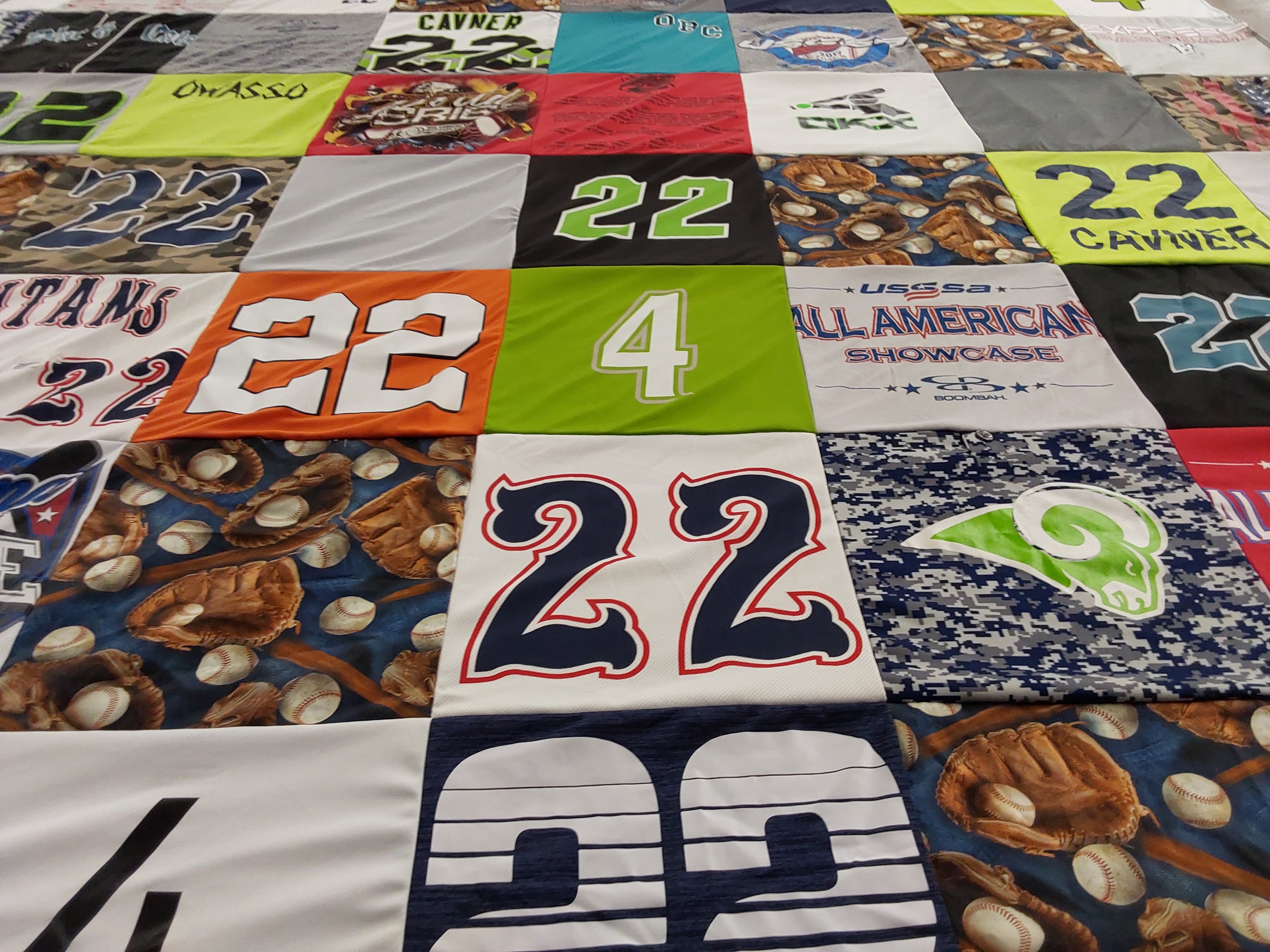 T-shirt quilt with sports, baseball themes by Karen from OK