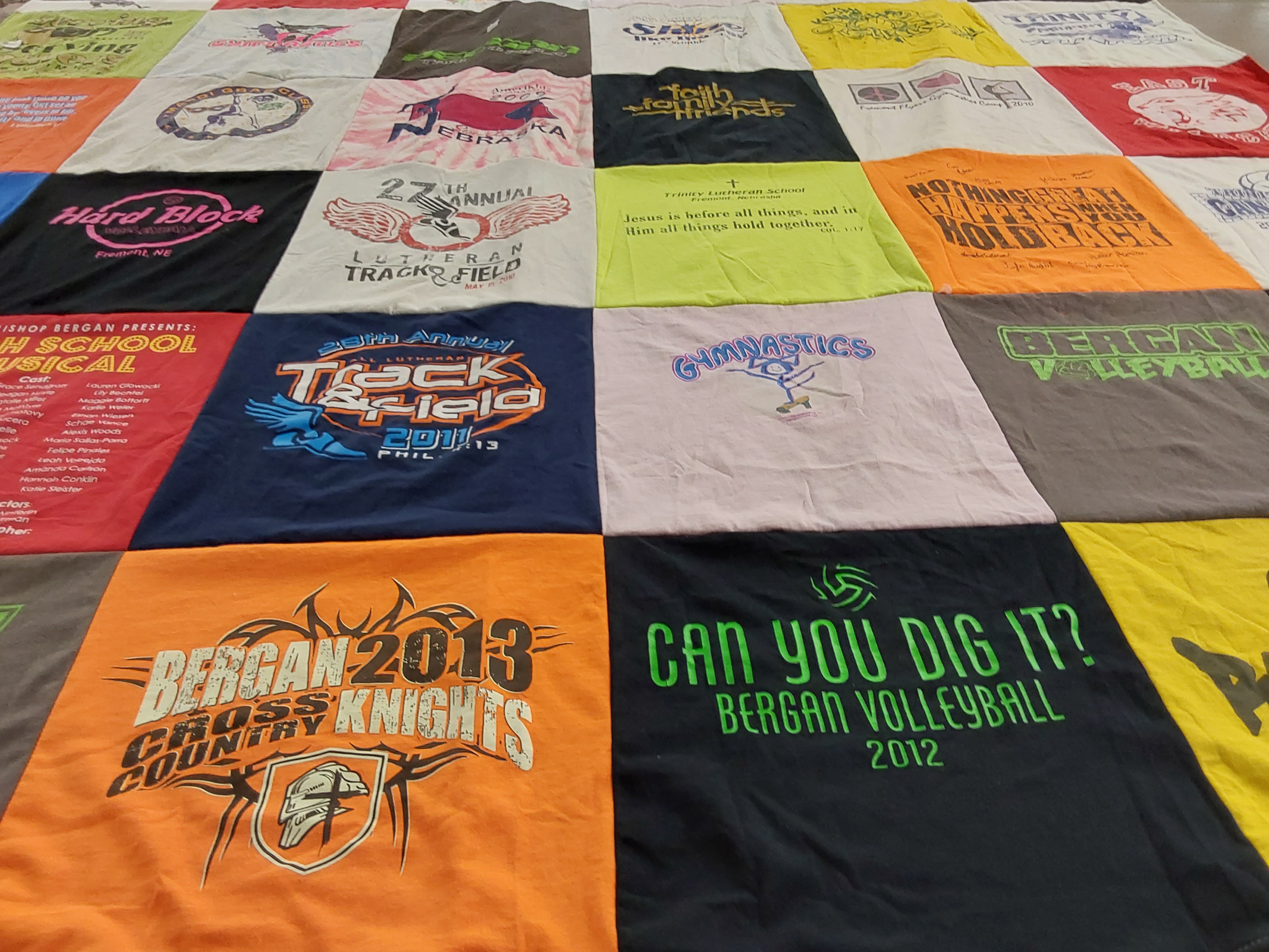 T-shirt quilt featuring bergant volleyball, bergant cross country knights by Peggy from NE