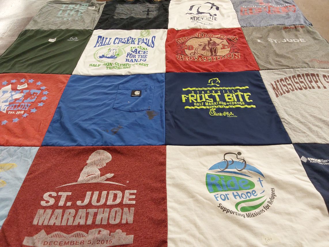T-shirt quilt featuring starkville half marathon, fall creek half triathlon by Gwendolyn from TN