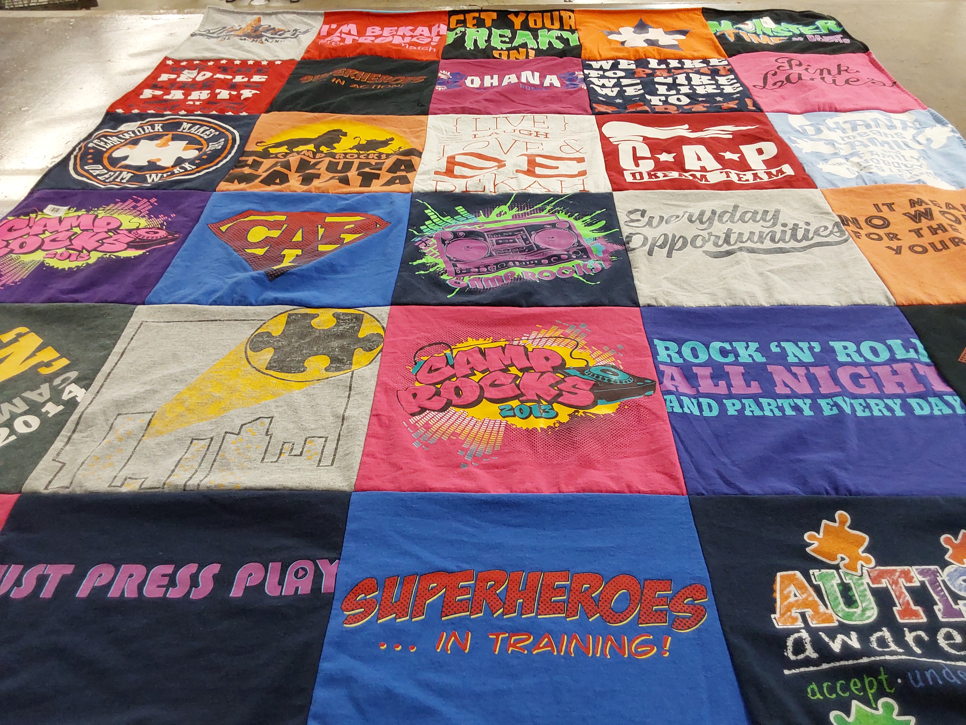 T-shirt quilt with autism awareness, friendship themes by Suzette from TX