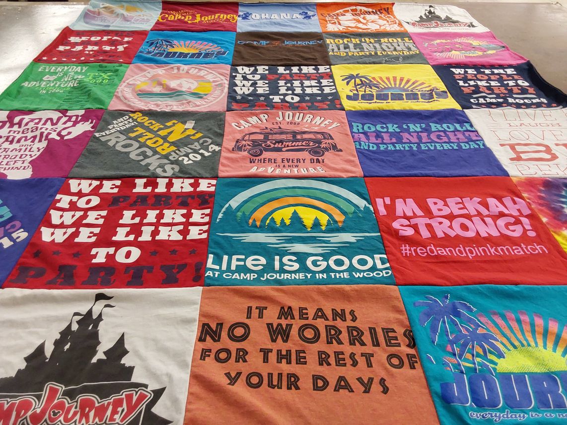 T-shirt quilt with camping, partying themes by Suzette from TX