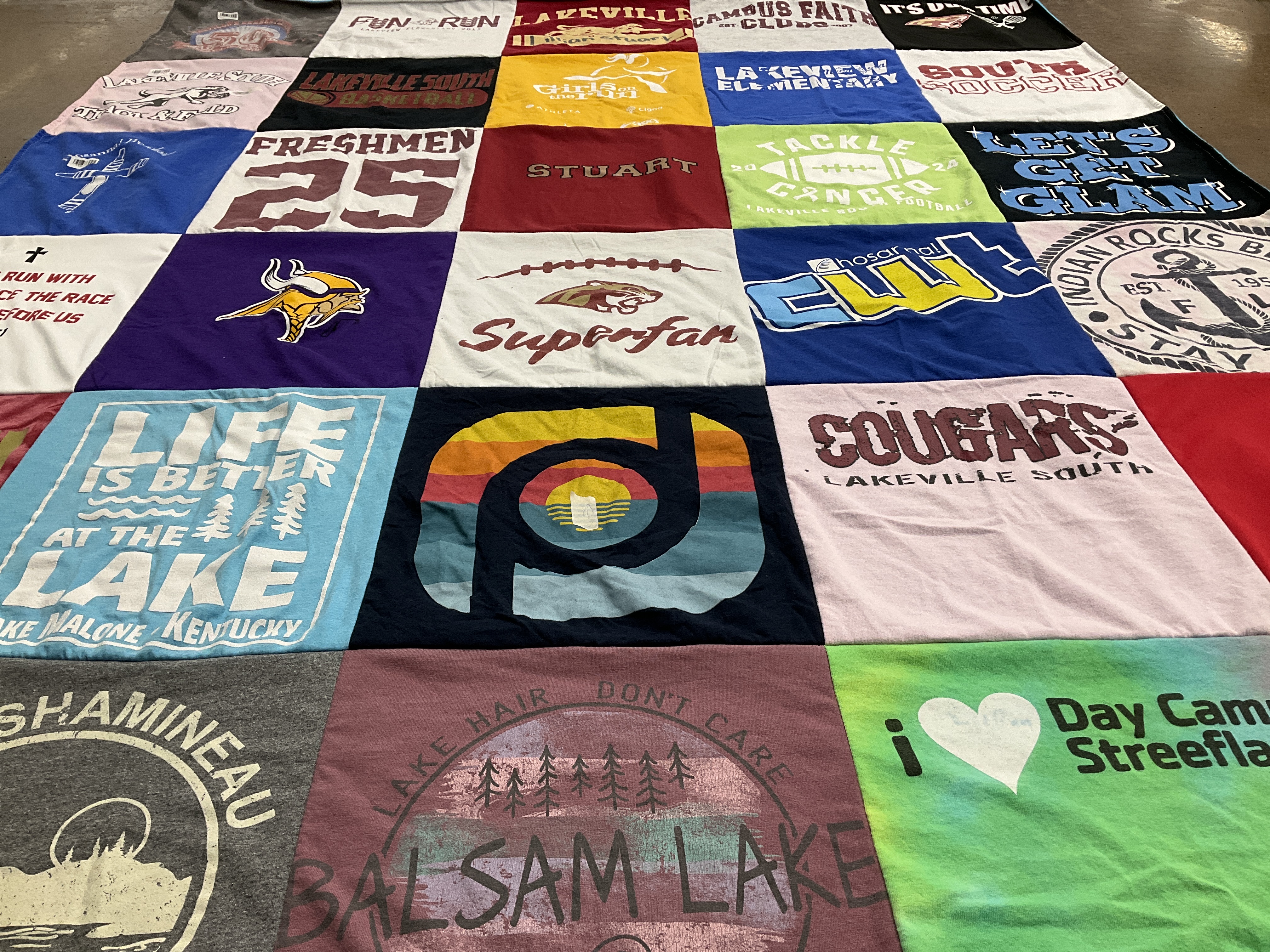 T-shirt quilt featuring lakeville south football team, lakeville south soccer team by Jodi from MN