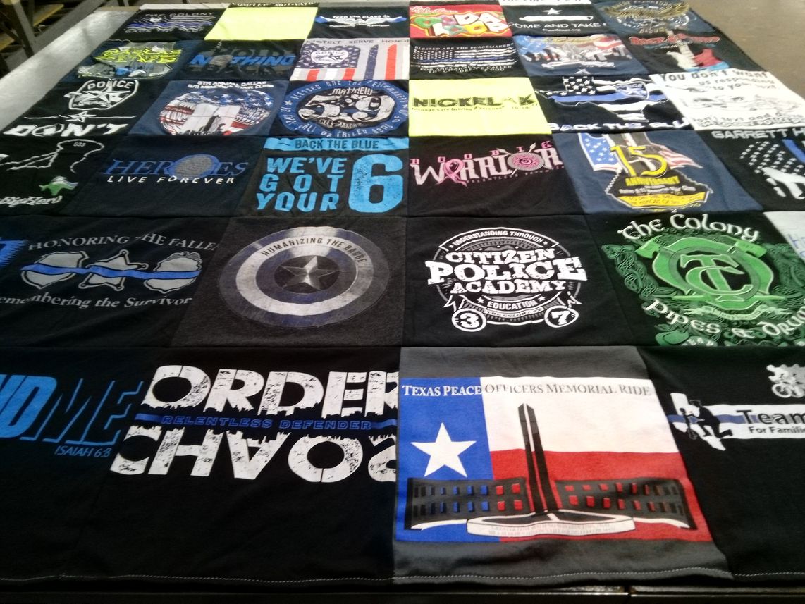 T-shirt quilt with law enforcement, community service themes by Keli from TX