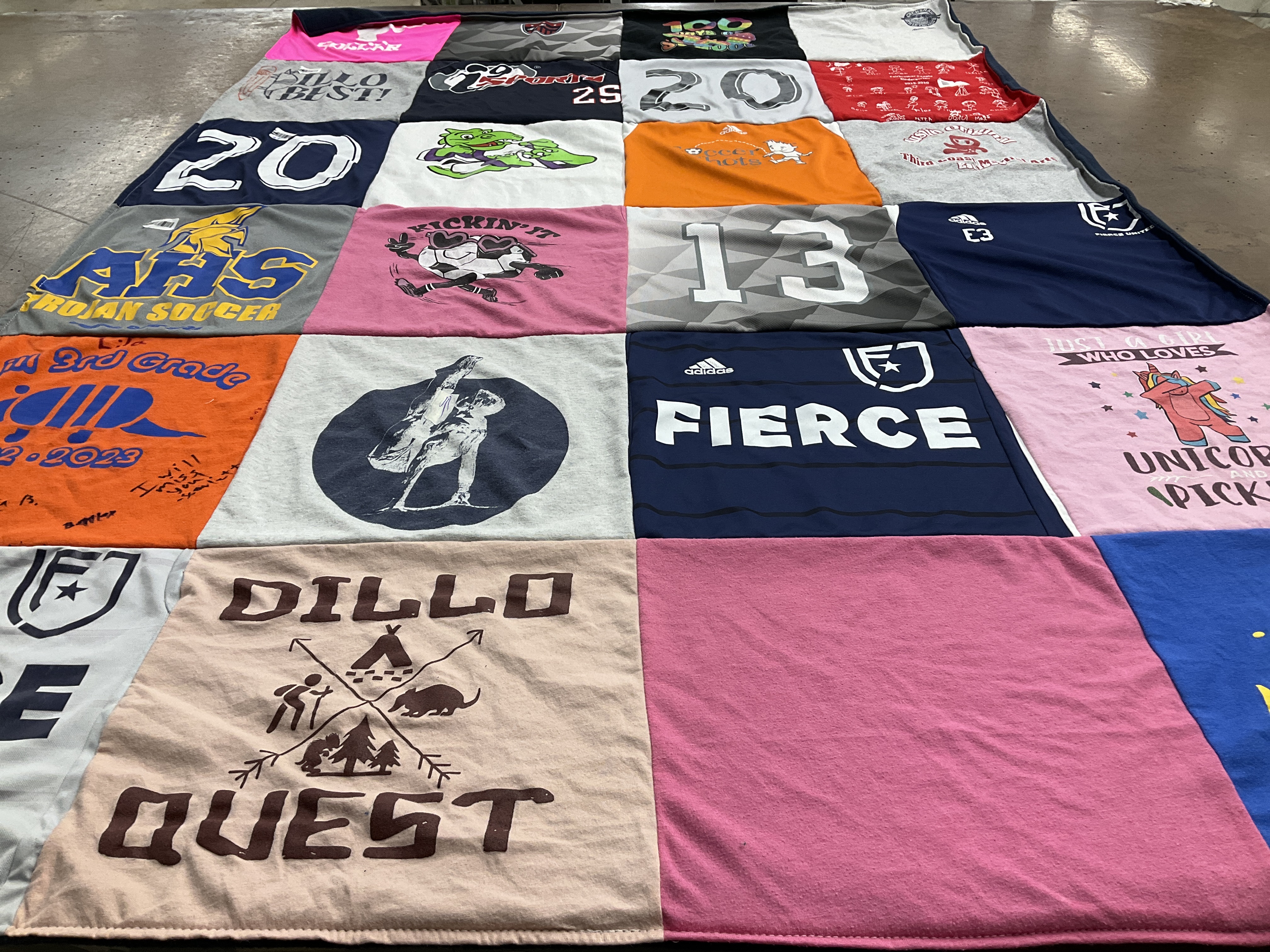 T-shirt quilt featuring austin high school soccer team by Lesley from TX