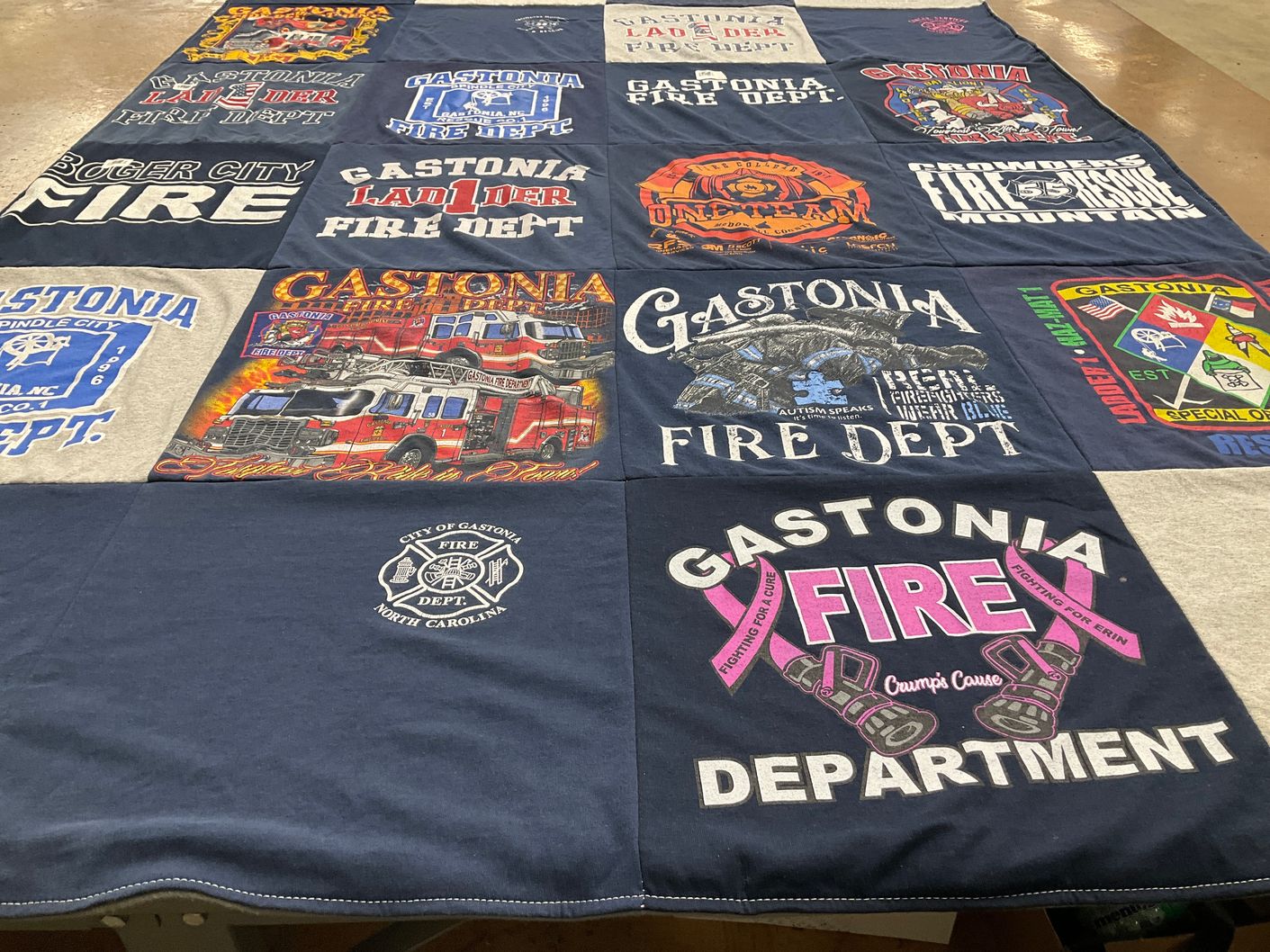 T-shirt quilt with firefighting, community service themes by Alyssa from NC