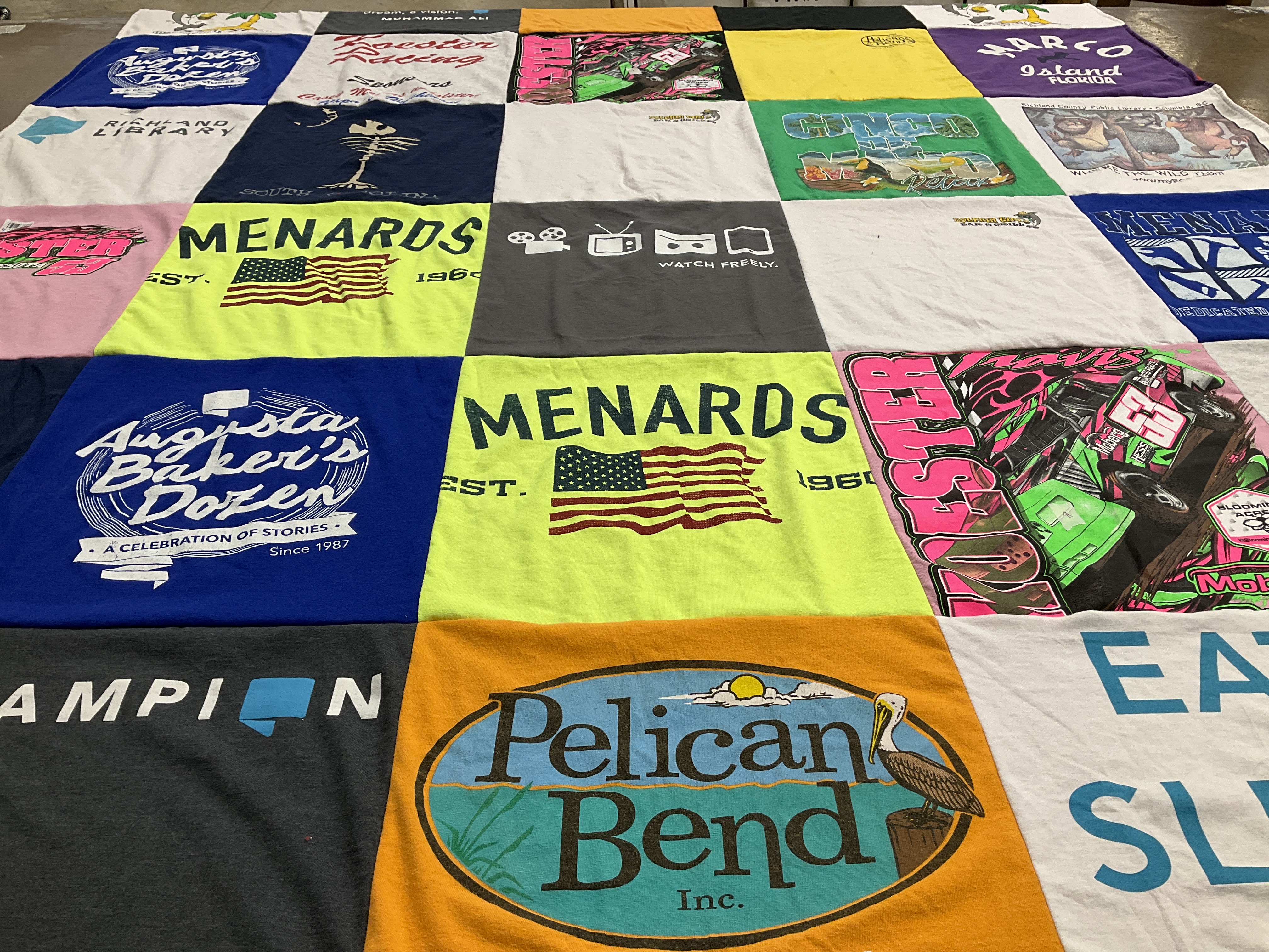 T-shirt quilt with racing, stories themes by Dennis from SC