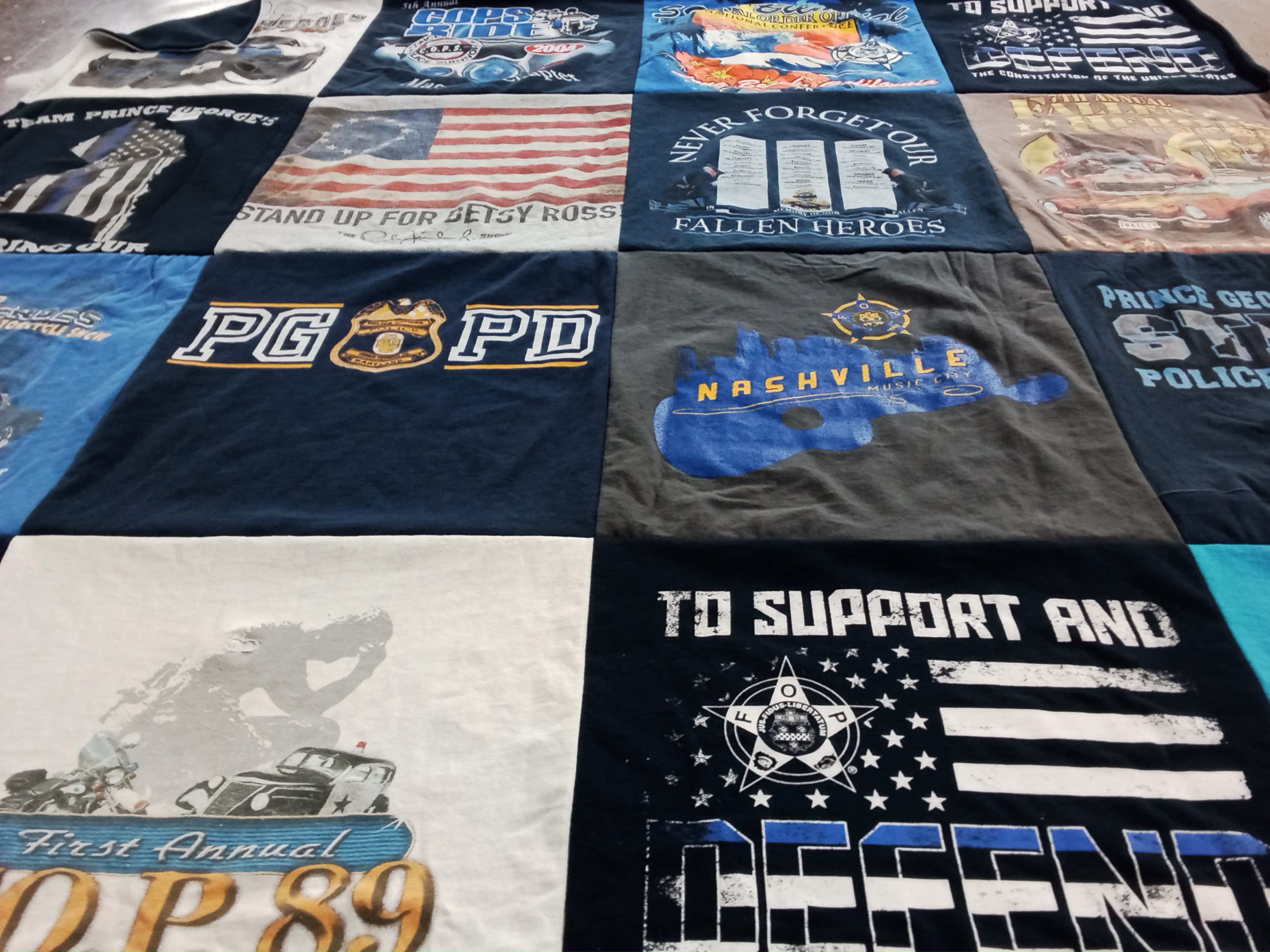T-shirt quilt with law enforcement, music themes by J from MD