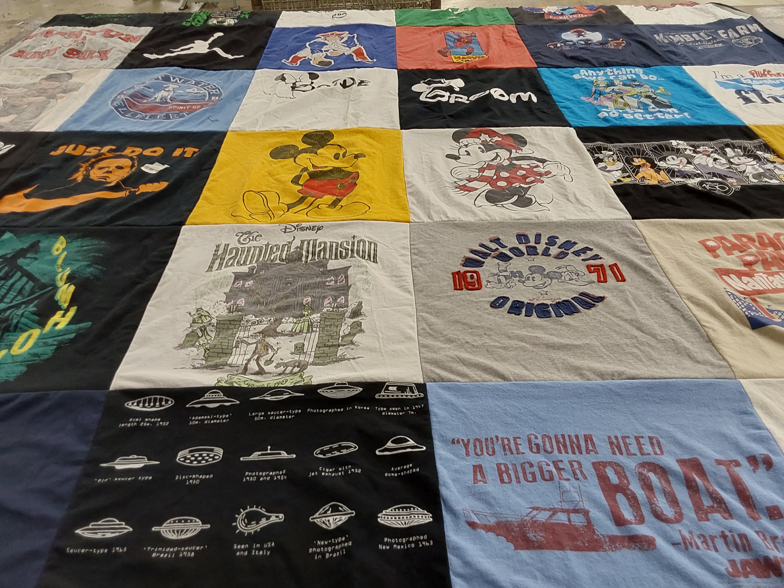 T-shirt quilt with disney, amusement parks themes by Karen from FL