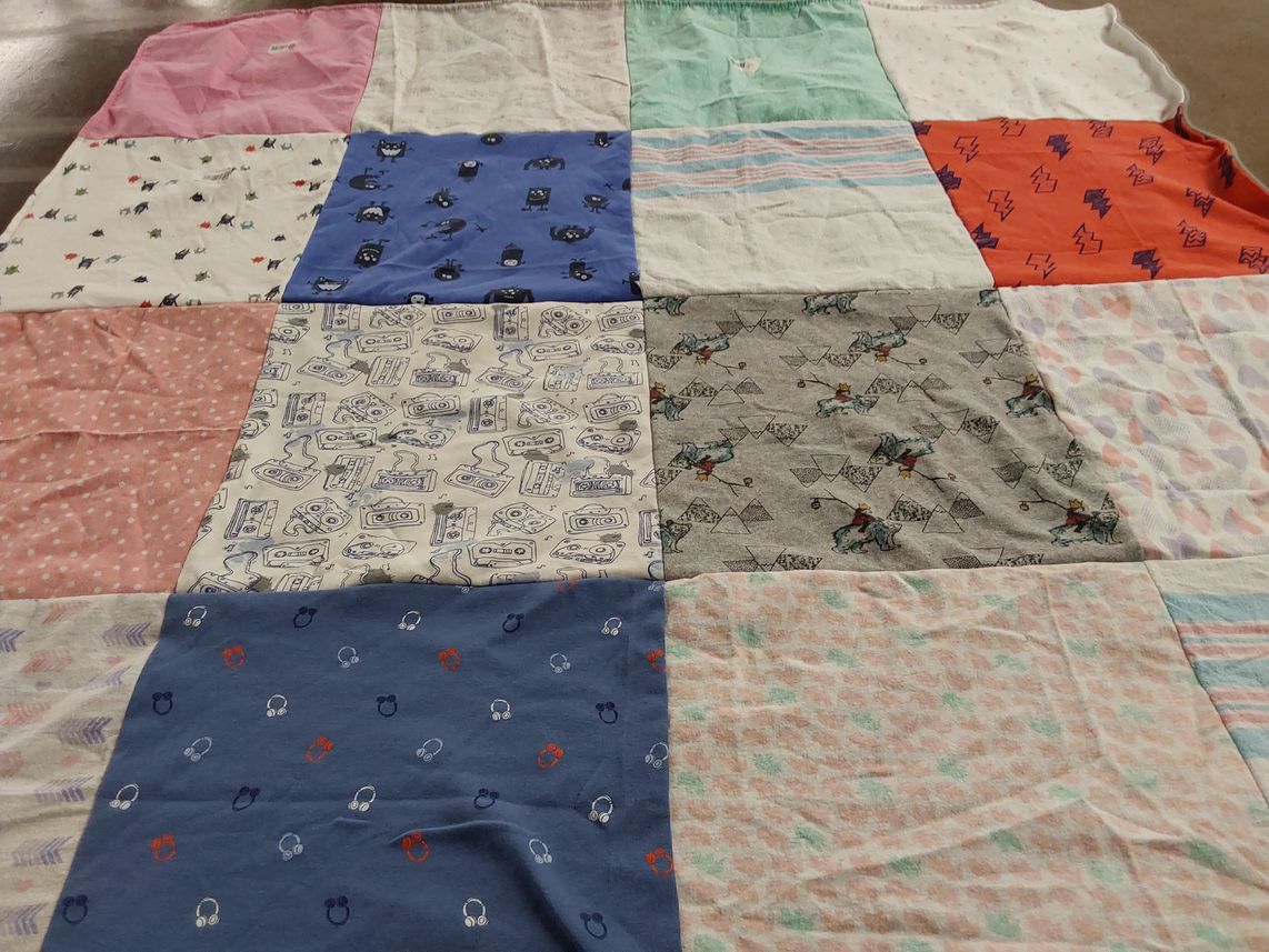 T-shirt quilt with music, animals themes by Meagan from NY