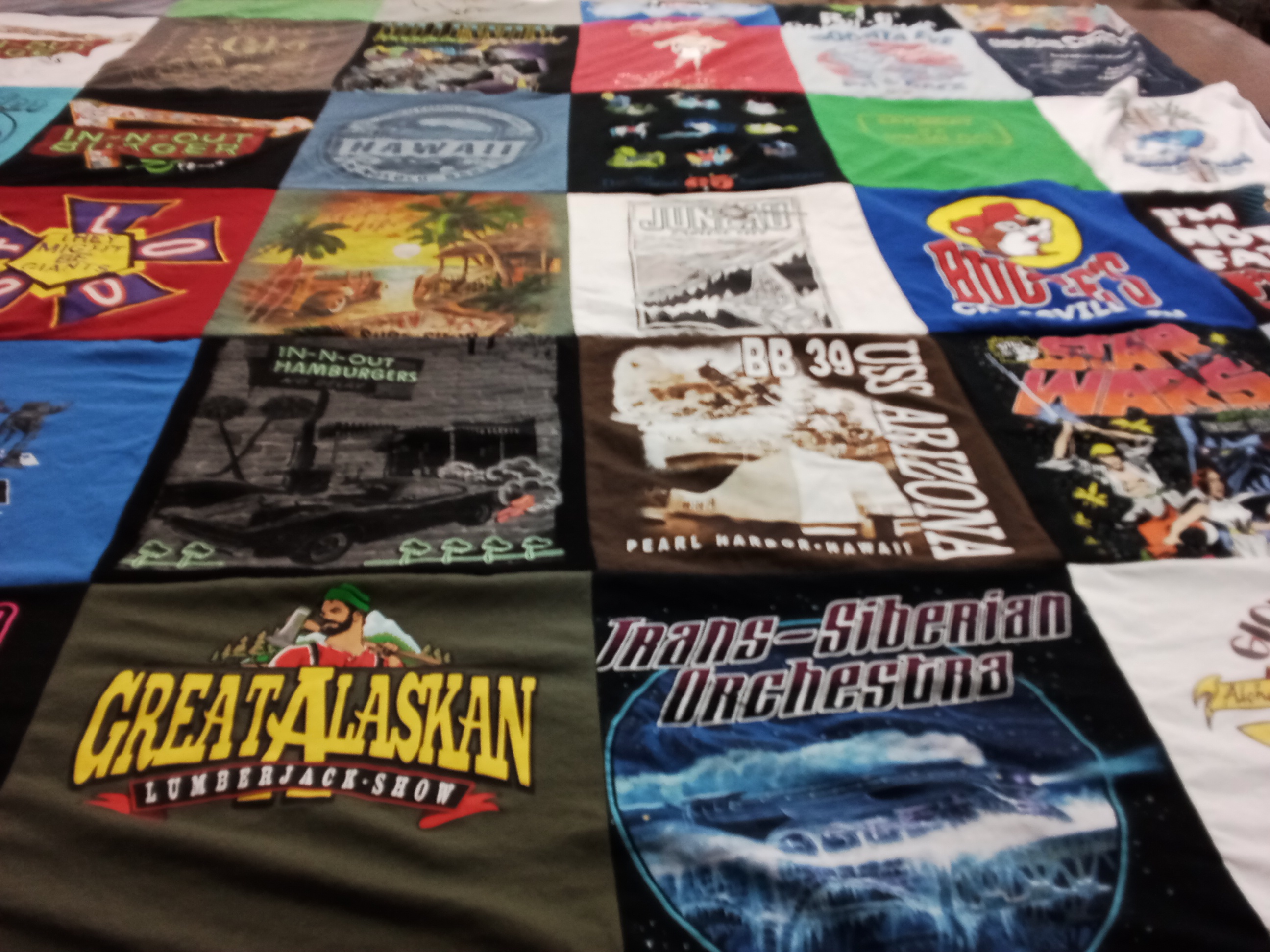 T-shirt quilt with cooking, music themes by Steve from WA