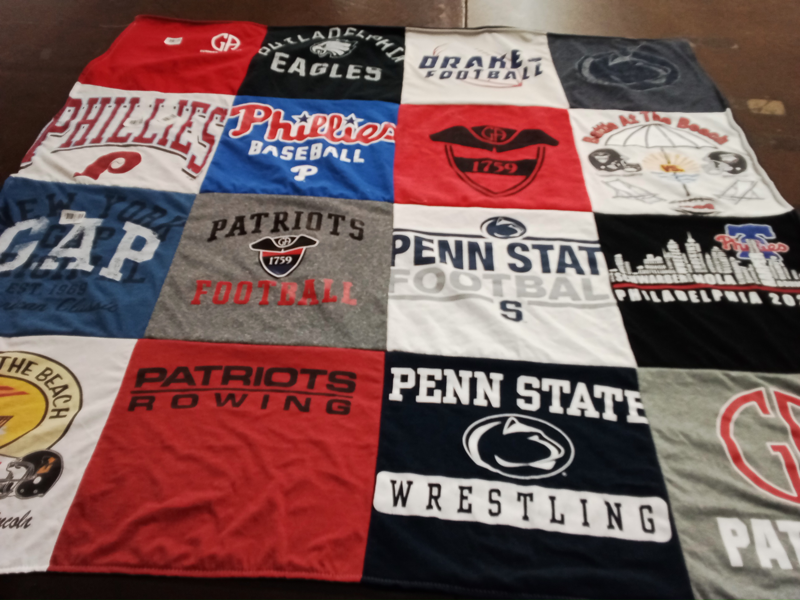 T-shirt quilt featuring drake university football, penn state university football by Karin from PA