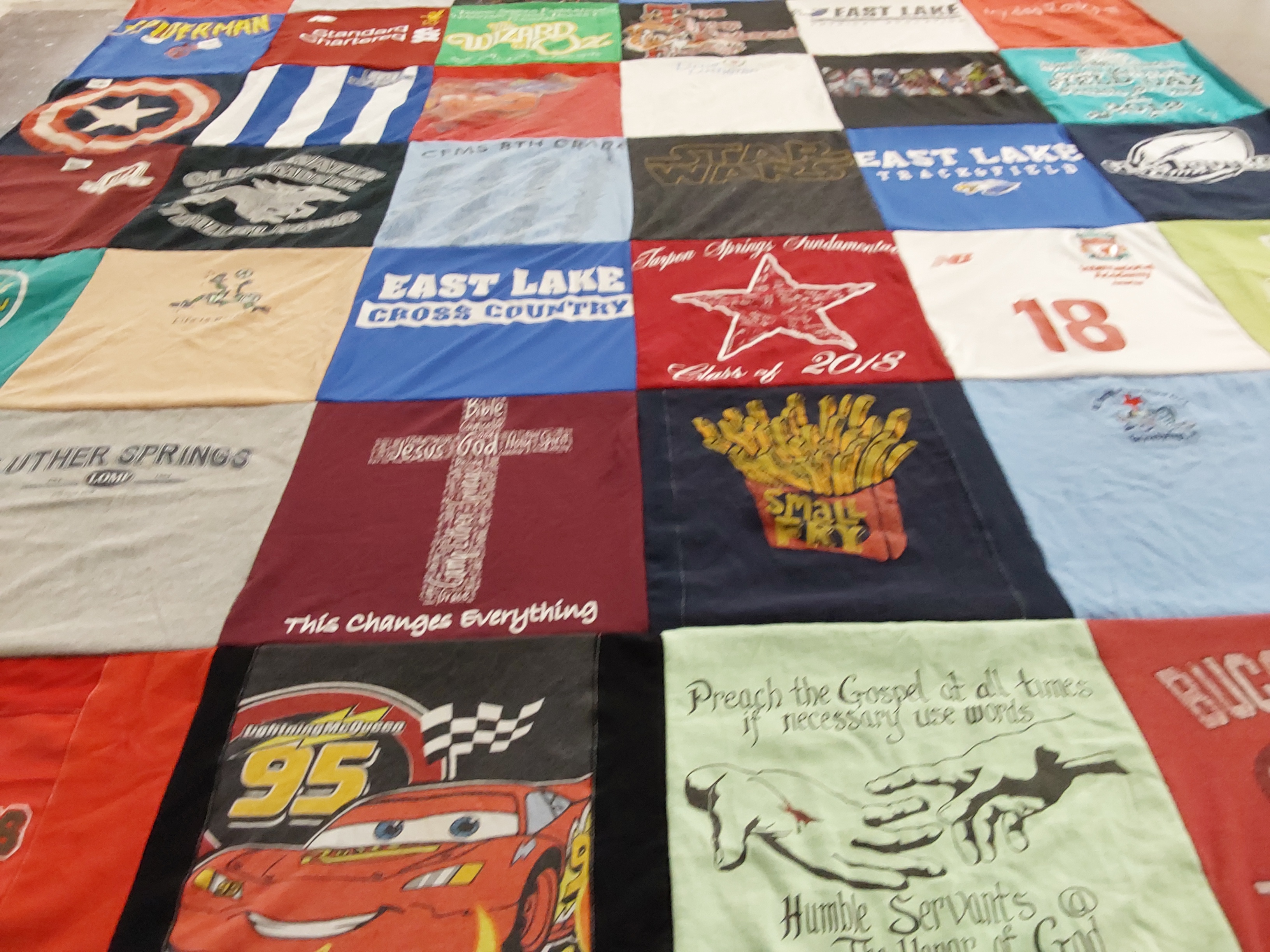 T-shirt quilt featuring east lake cross country team by Laura from FL