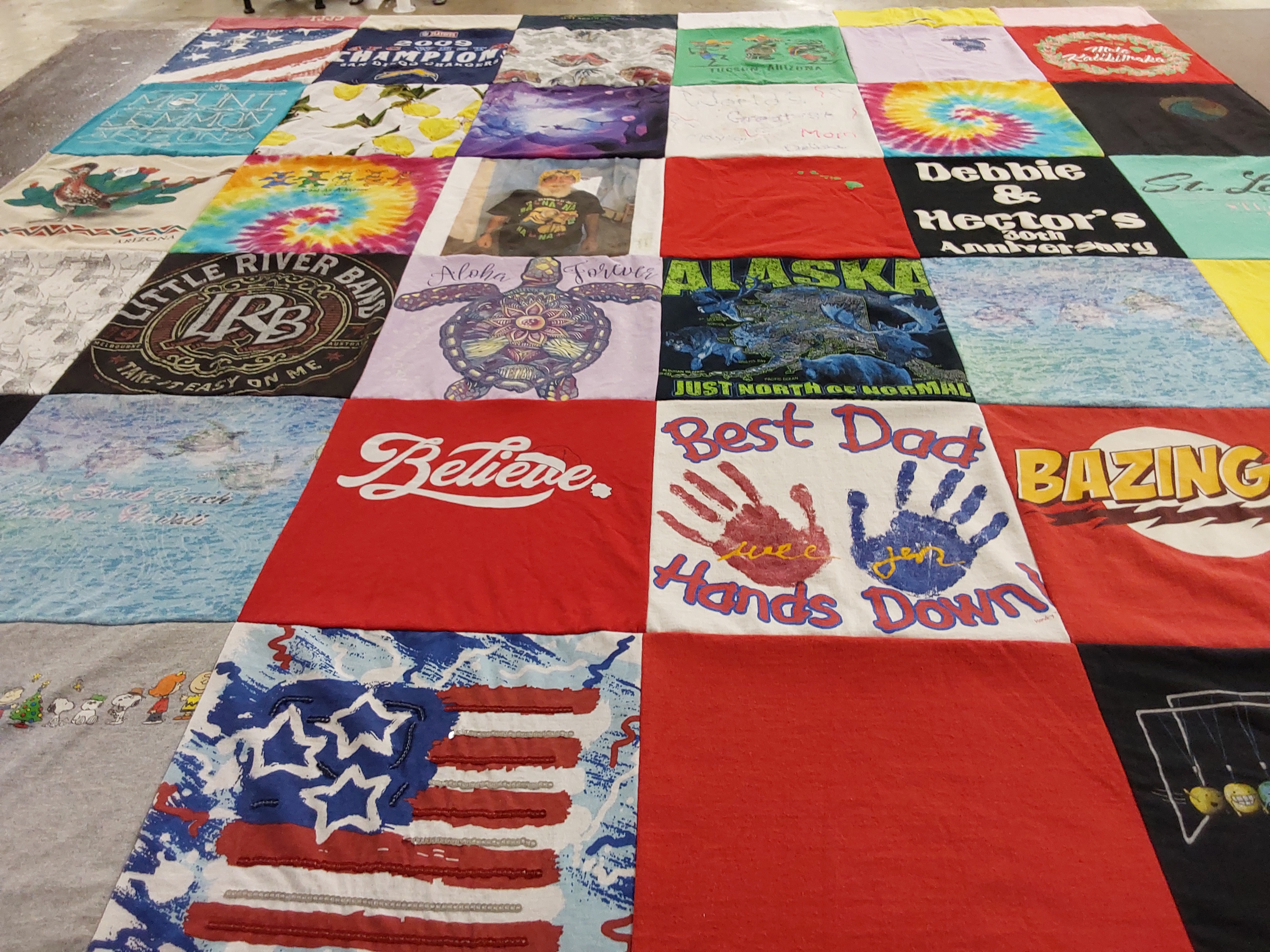 T-shirt quilt with music, family themes by Deborah from CA