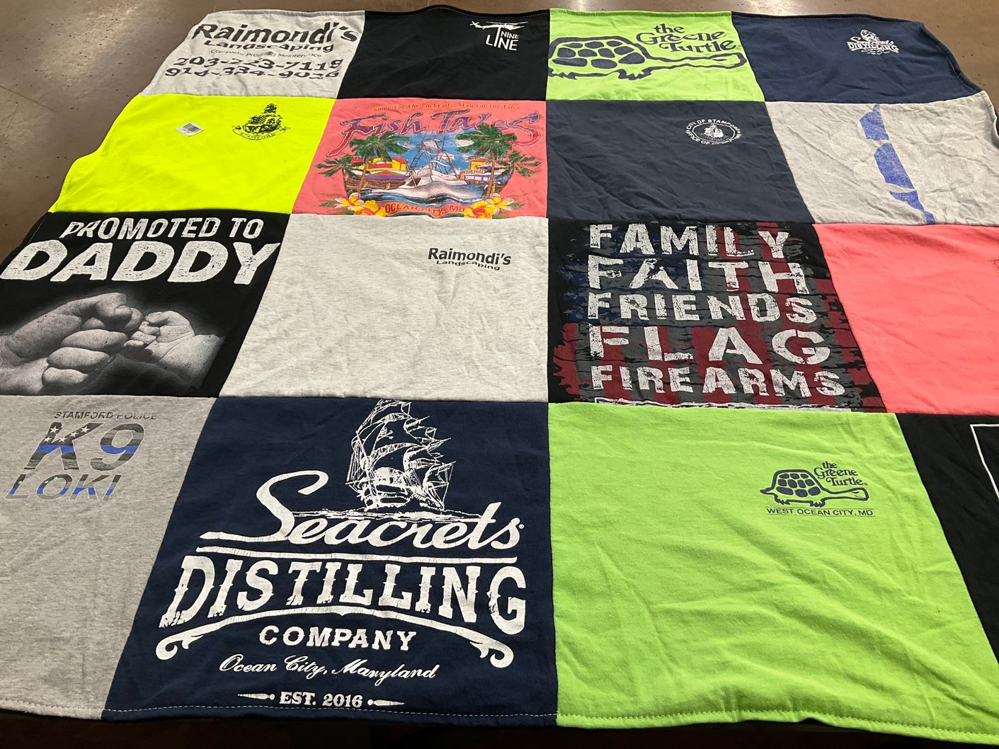 T-shirt quilt with family, fishing themes by Erica from NY