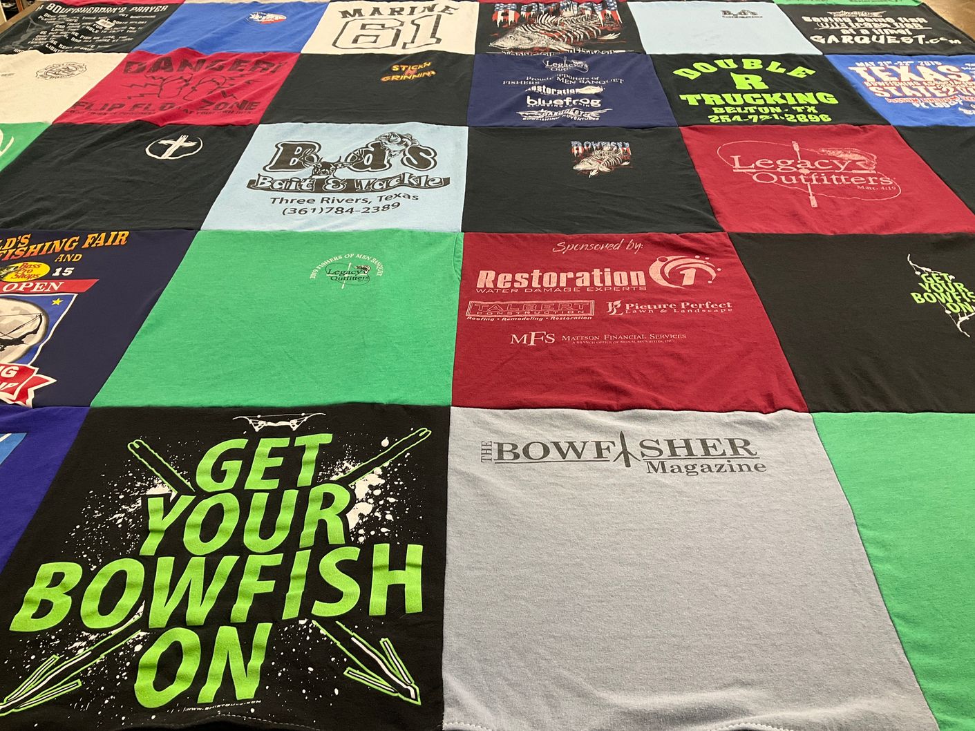 T-shirt quilt with fishing, outdoors themes by Harriett from TN