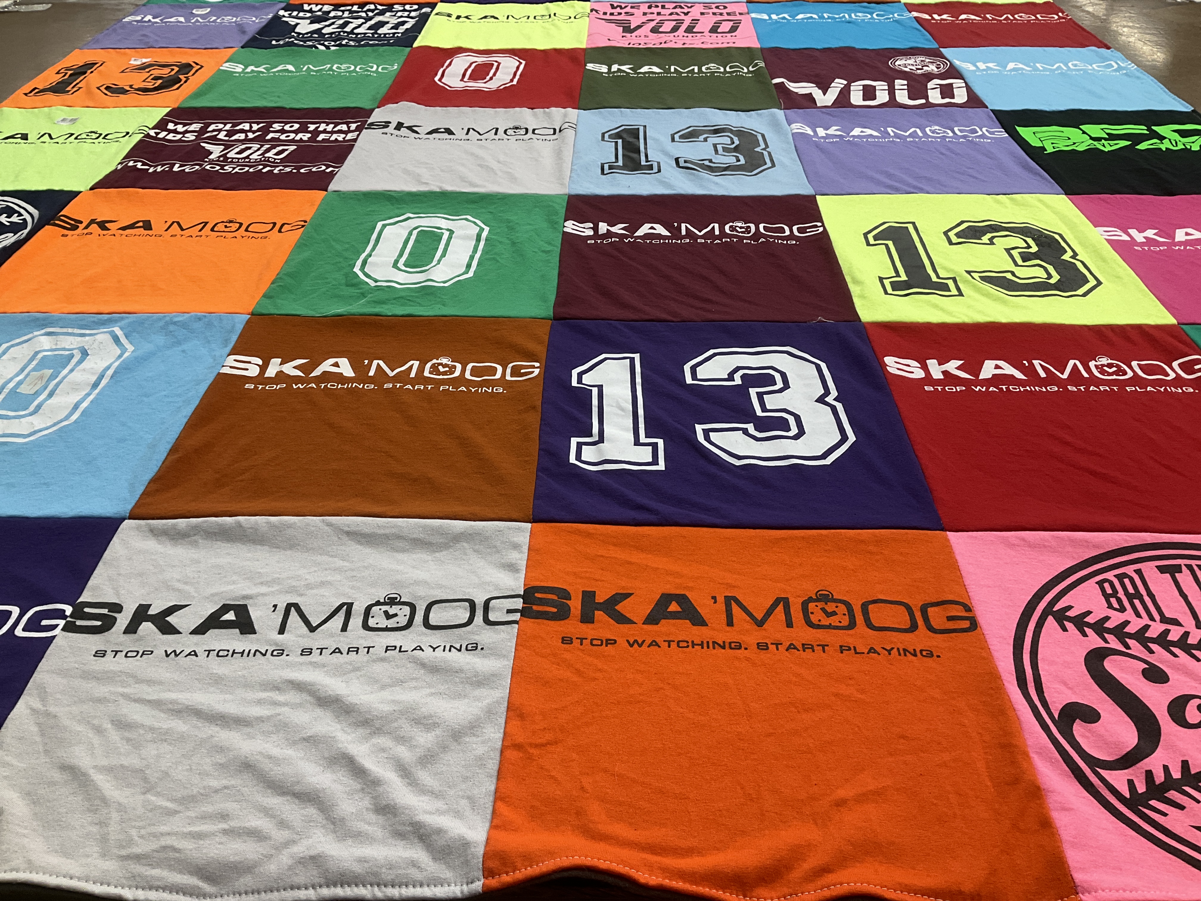 T-shirt quilt with sports, gaming themes by Courtney from MD